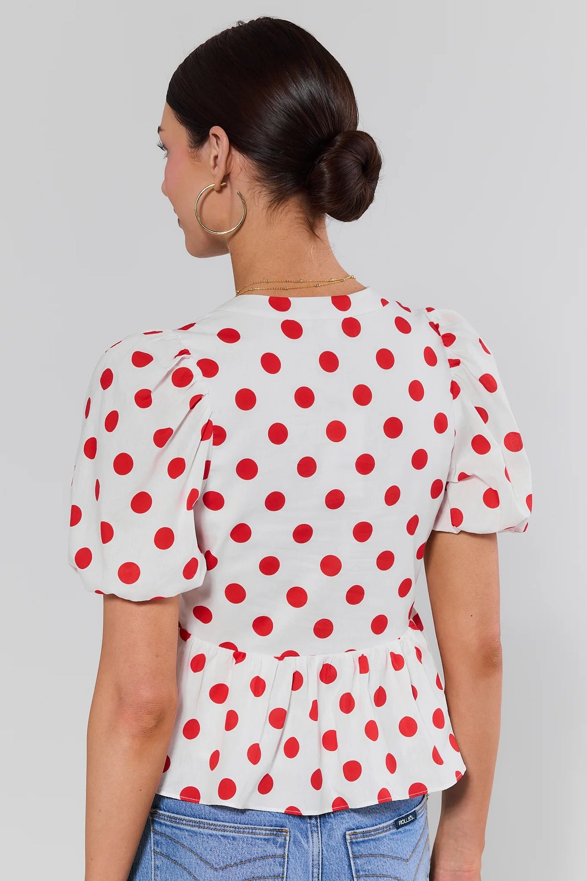 Georgie Red Polka Dot Peplum Top puff sleeve and peplum hem detail - Back View | Avara