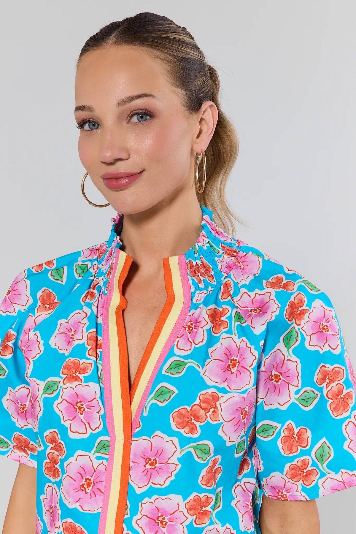 Macey Blue Floral Top by THML - Close-Up Detail, smocked neckline and striped V-trim | Avara
