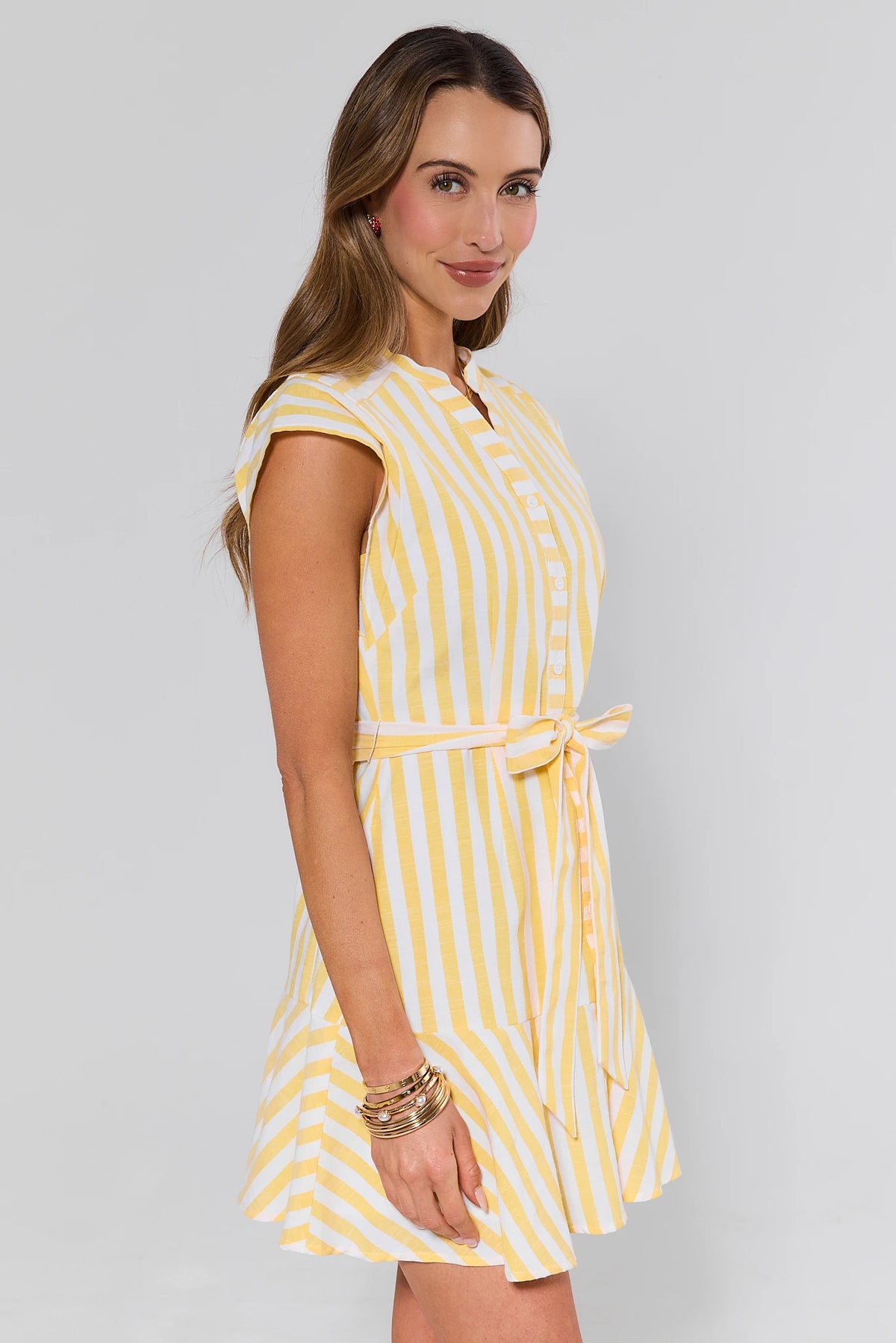 Erica Yellow and White Striped Dress - Side Profile Showing A-Line Silhouette | Avara