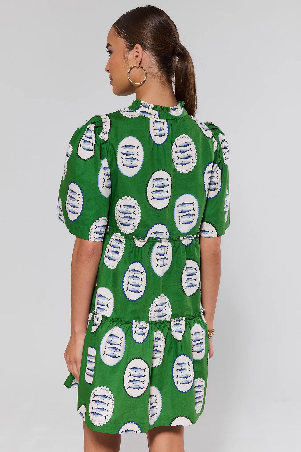 Evan Green Printed Short Dress showing tiered back, puff sleeves, and sardine print, back view | Avara