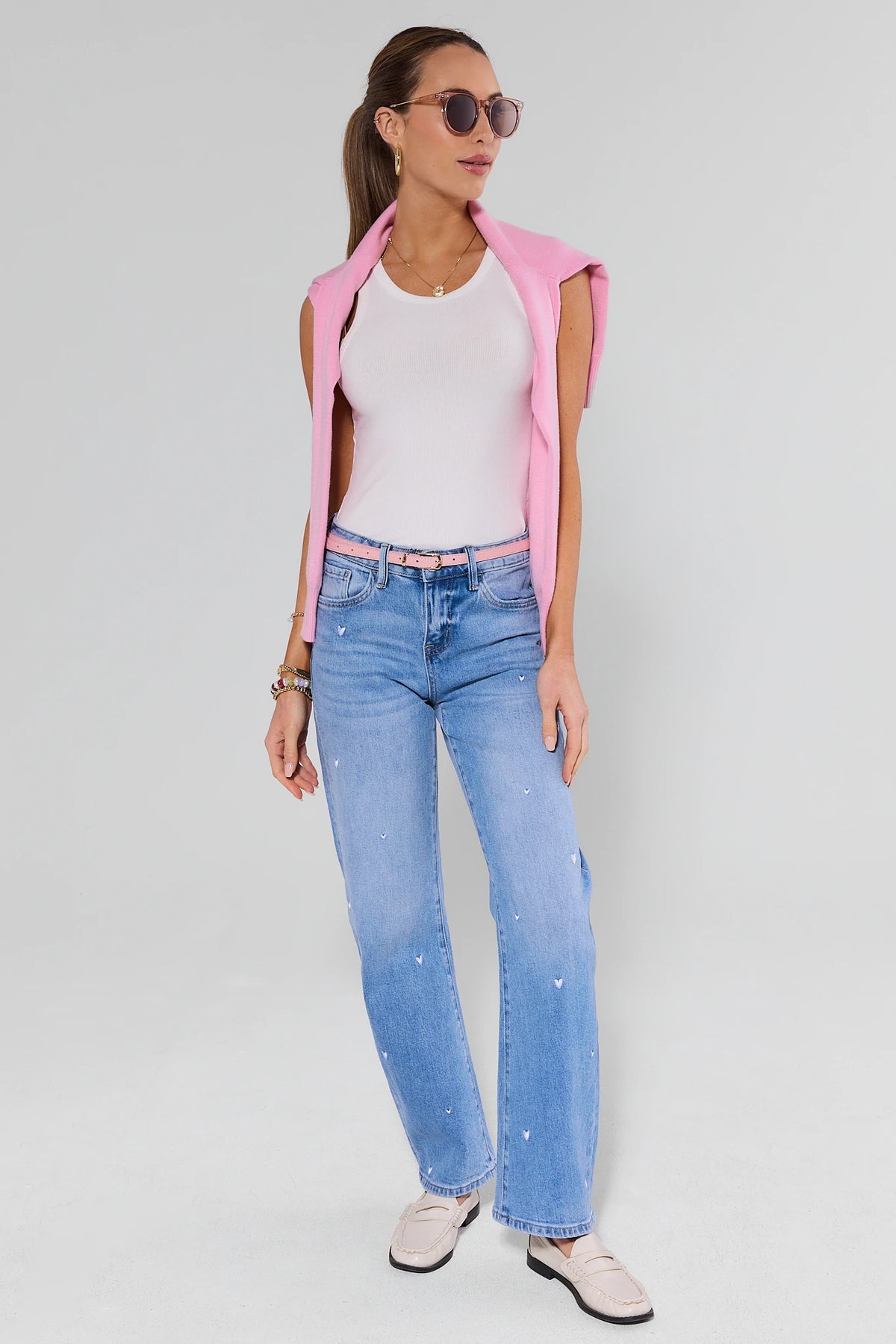 Hadley Medium Wash Embroidered Jeans styled with pink vest and white tank - Full Look | Avara