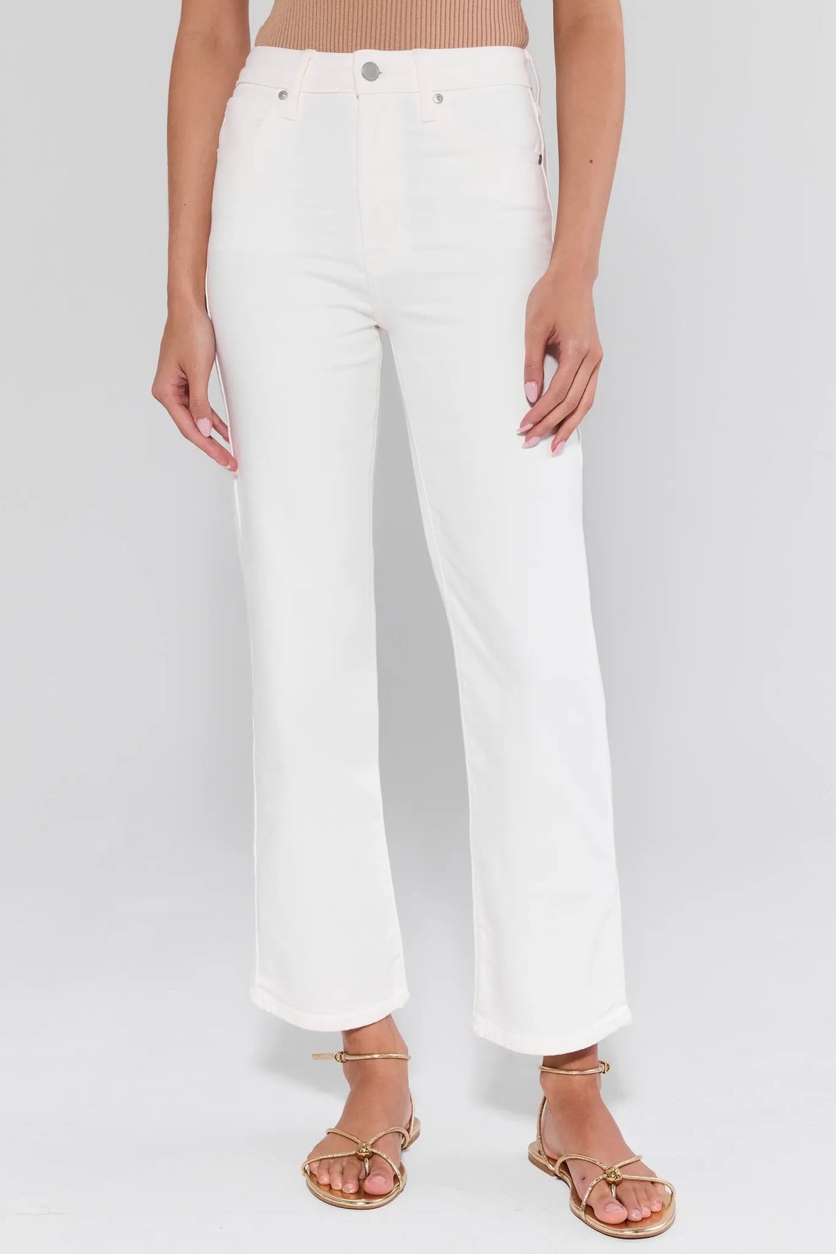 White high-rise Tara Straight Leg Ankle Jeans - Front View, styled with gold sandals | Avara