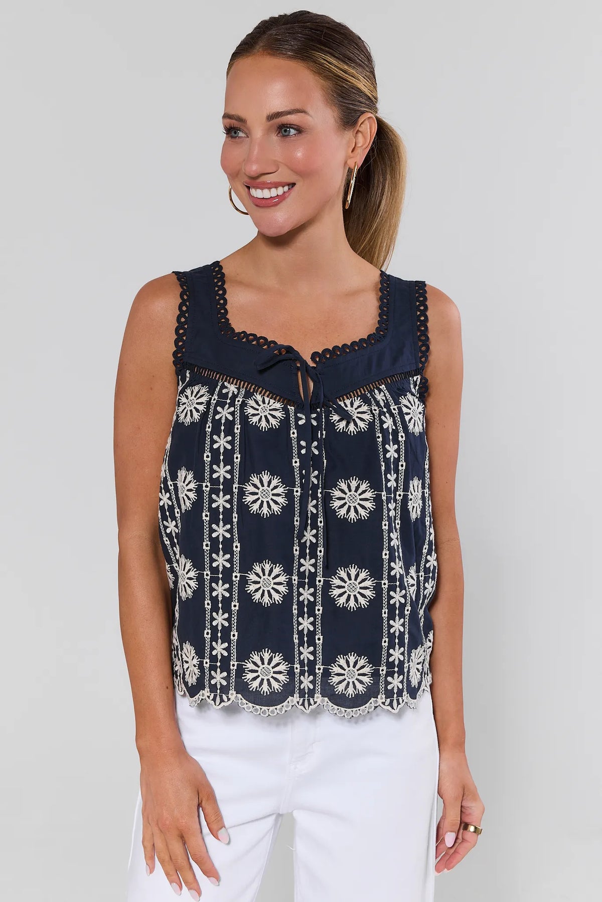 Navy embroidered tank top with cream floral eyelet detail and scallop hem - Front View | Avara