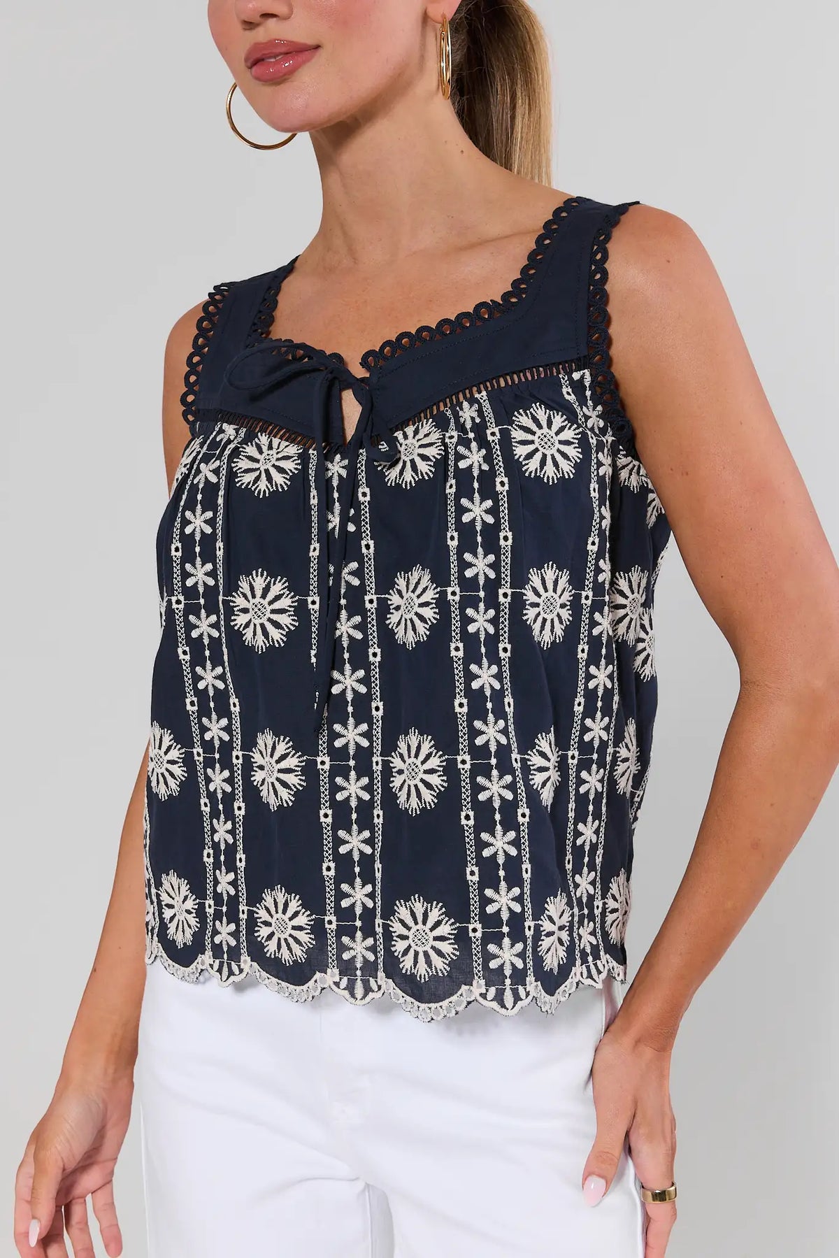 Navy womens embroidered tank top with self-tie neckline and looped trim straps - Close-Up Detail | Avara