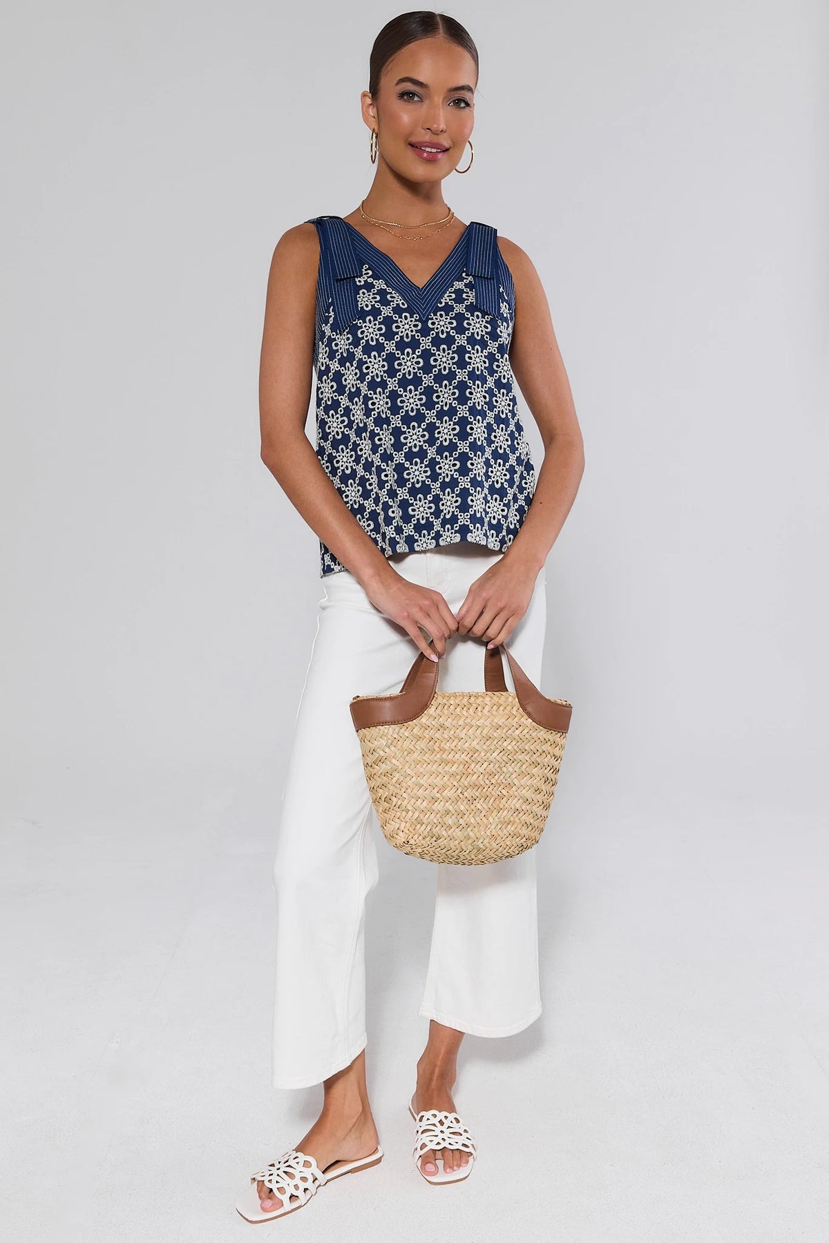 Michelle Navy Embroidered Tank Top back view showing V-back neckline with white floral embroidery detail | Avara
