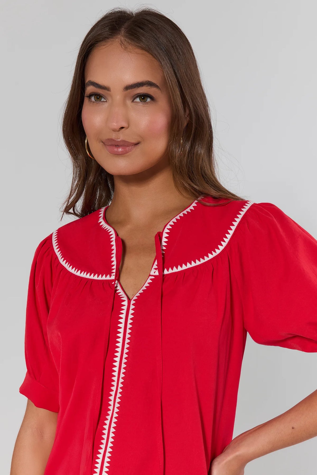 Gabriela Red Stitched Trim Top close-up of white whipstitch trim and V-neckline detail | Avara