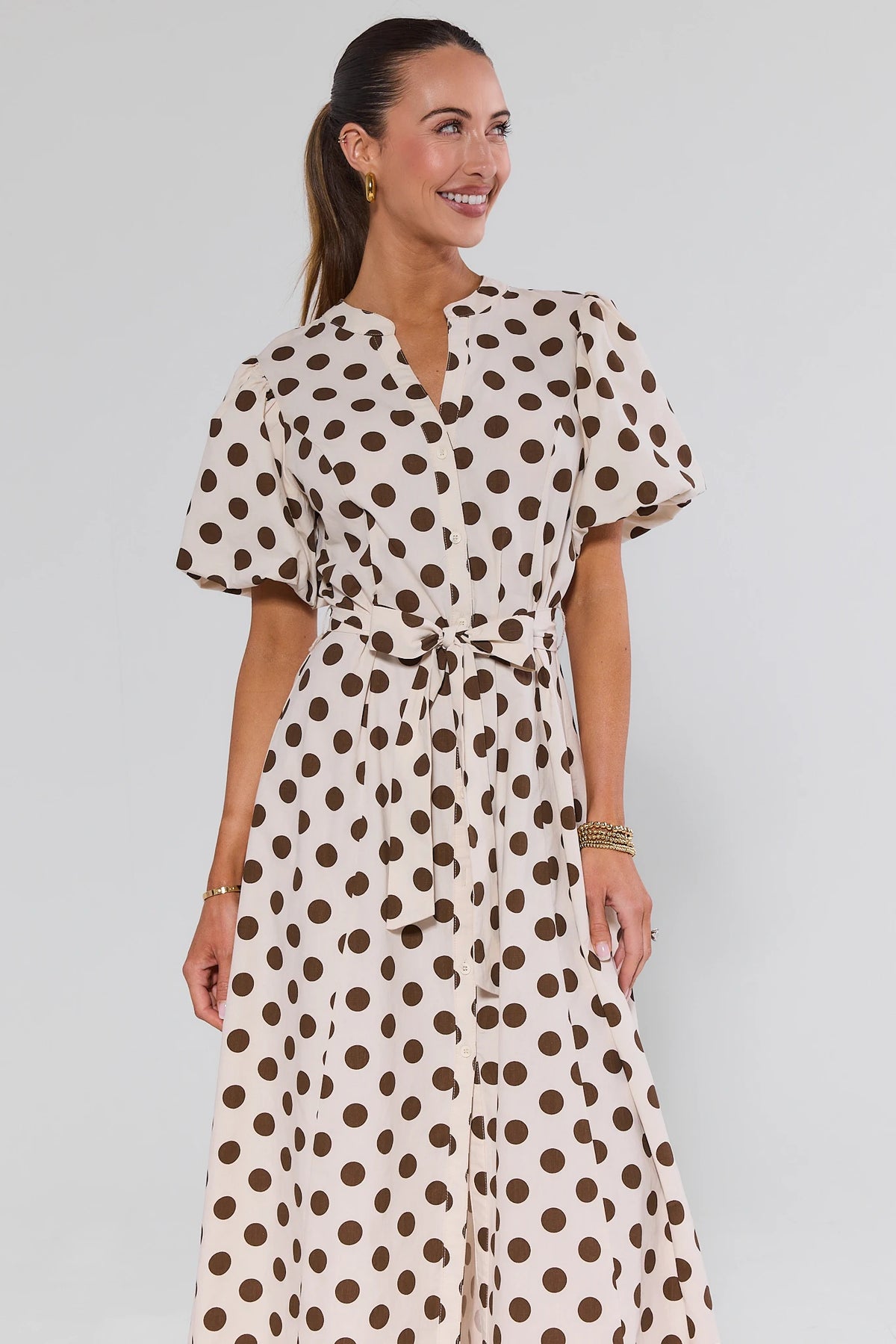 Cream polka dot midi dress with brown dots, tie waist and puff sleeves - Side View | Avara