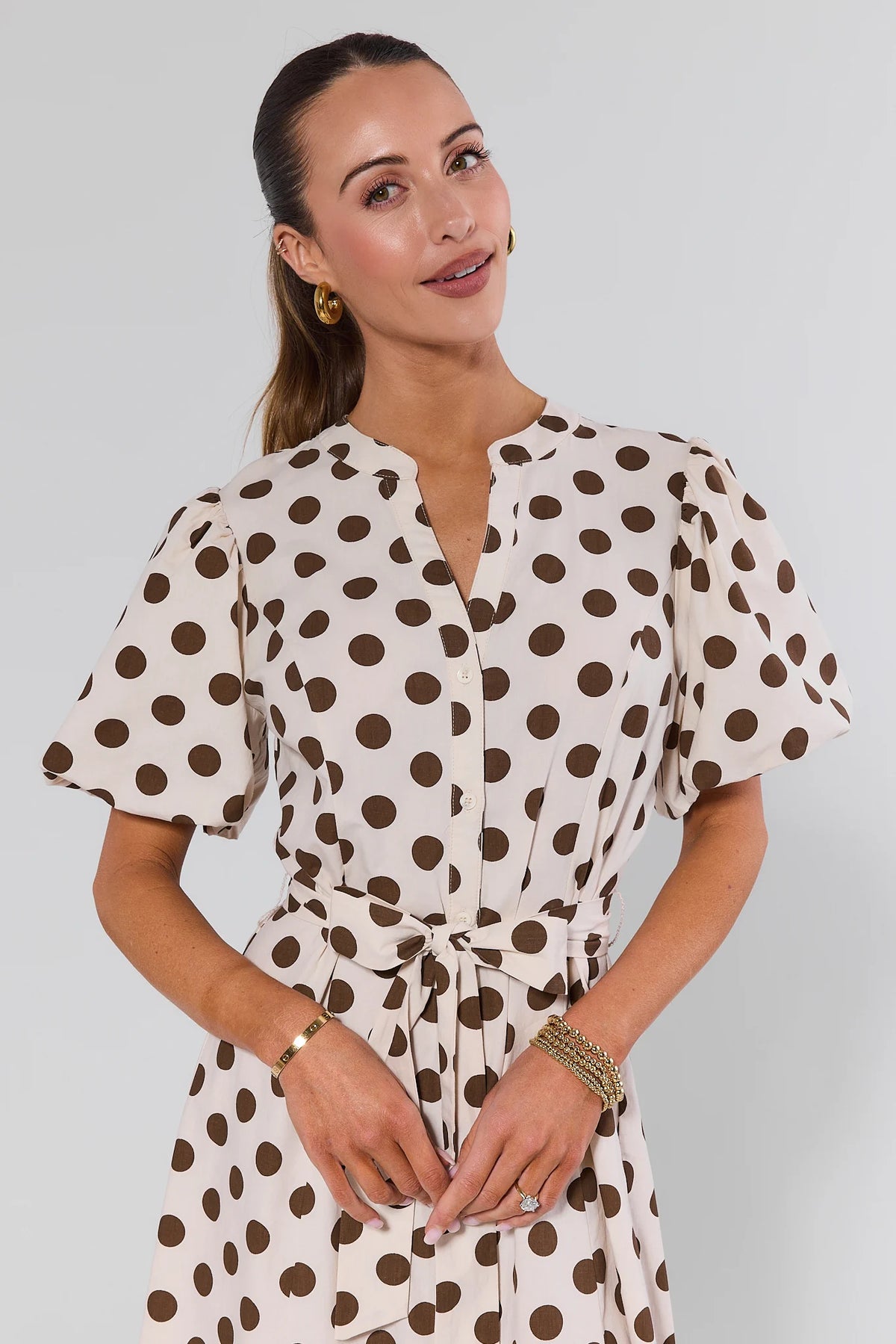 Cream polka dot midi dress with brown dots, button front and tie waist - Close-Up Detail | Avara