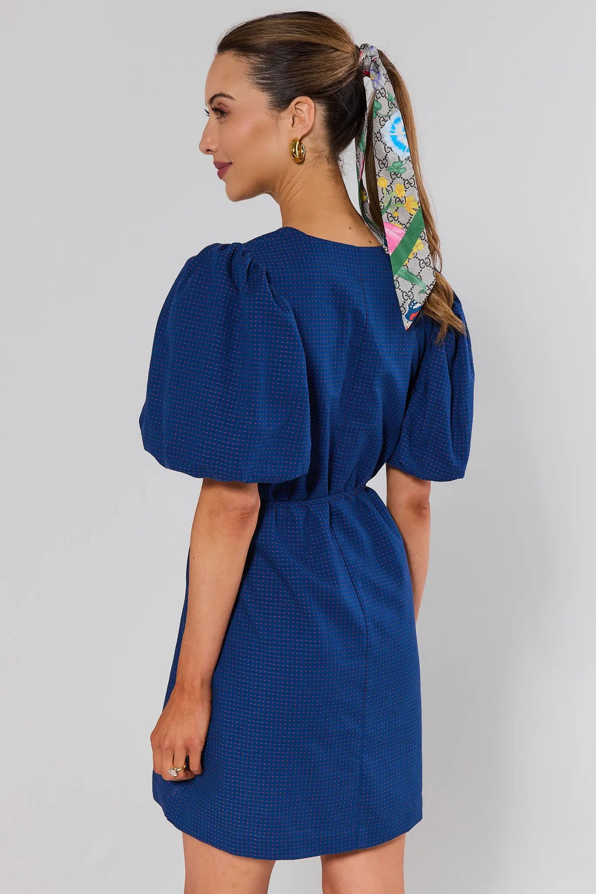 Navy micro-dot puff sleeve short dress back view with colorful hair scarf - Back View | Avara