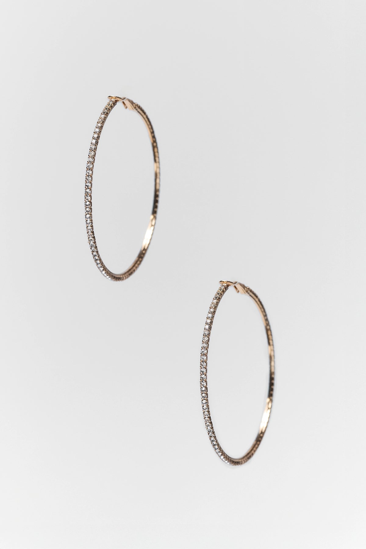 Gold rhinestone hoop earrings pair - Product View, allover crystal embellishments on gold hoops | Avara