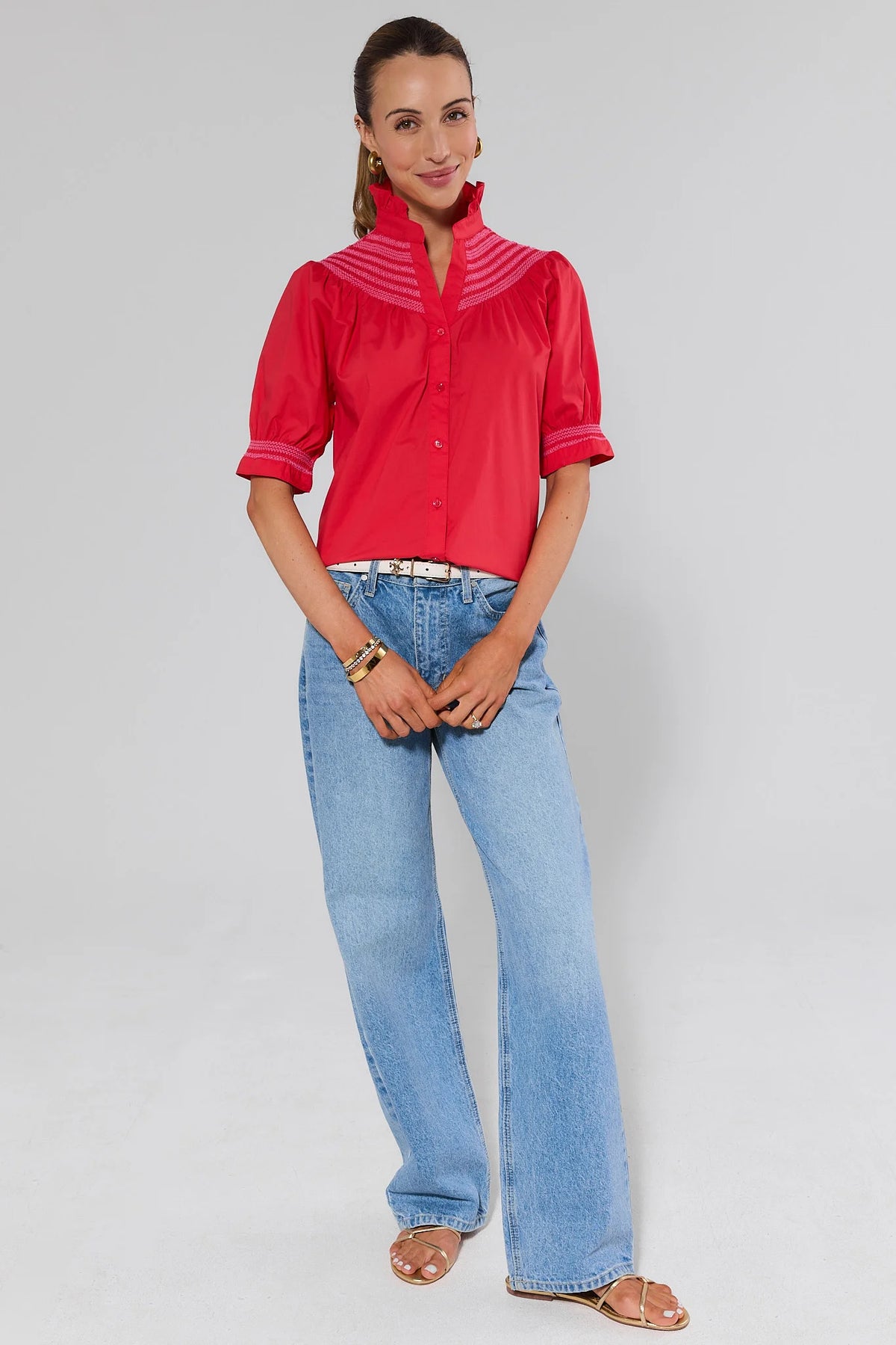 Red embroidered top with wide-leg jeans and gold sandals - Full Length Front View | Avara