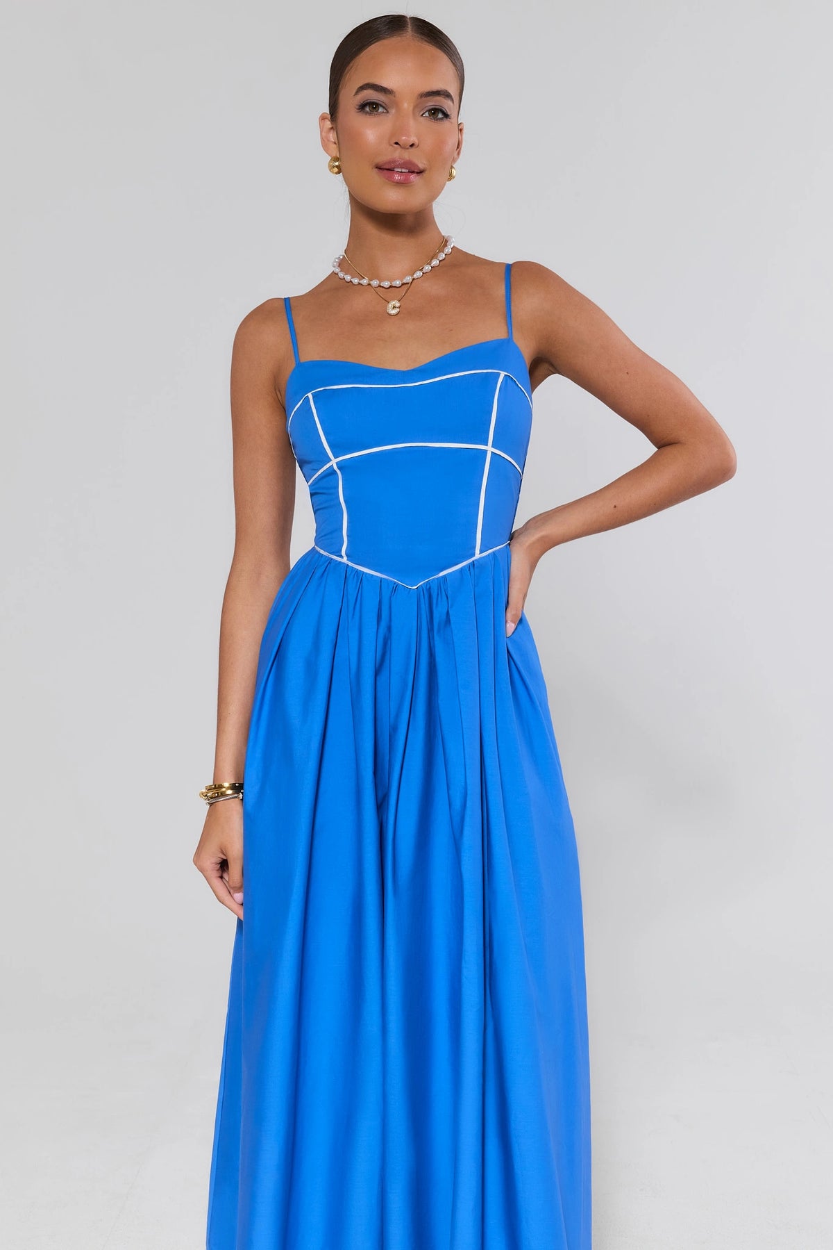 Blue Contrast Trim Maxi Dress with white piping bodice detail - Front Three-Quarter View | Avara