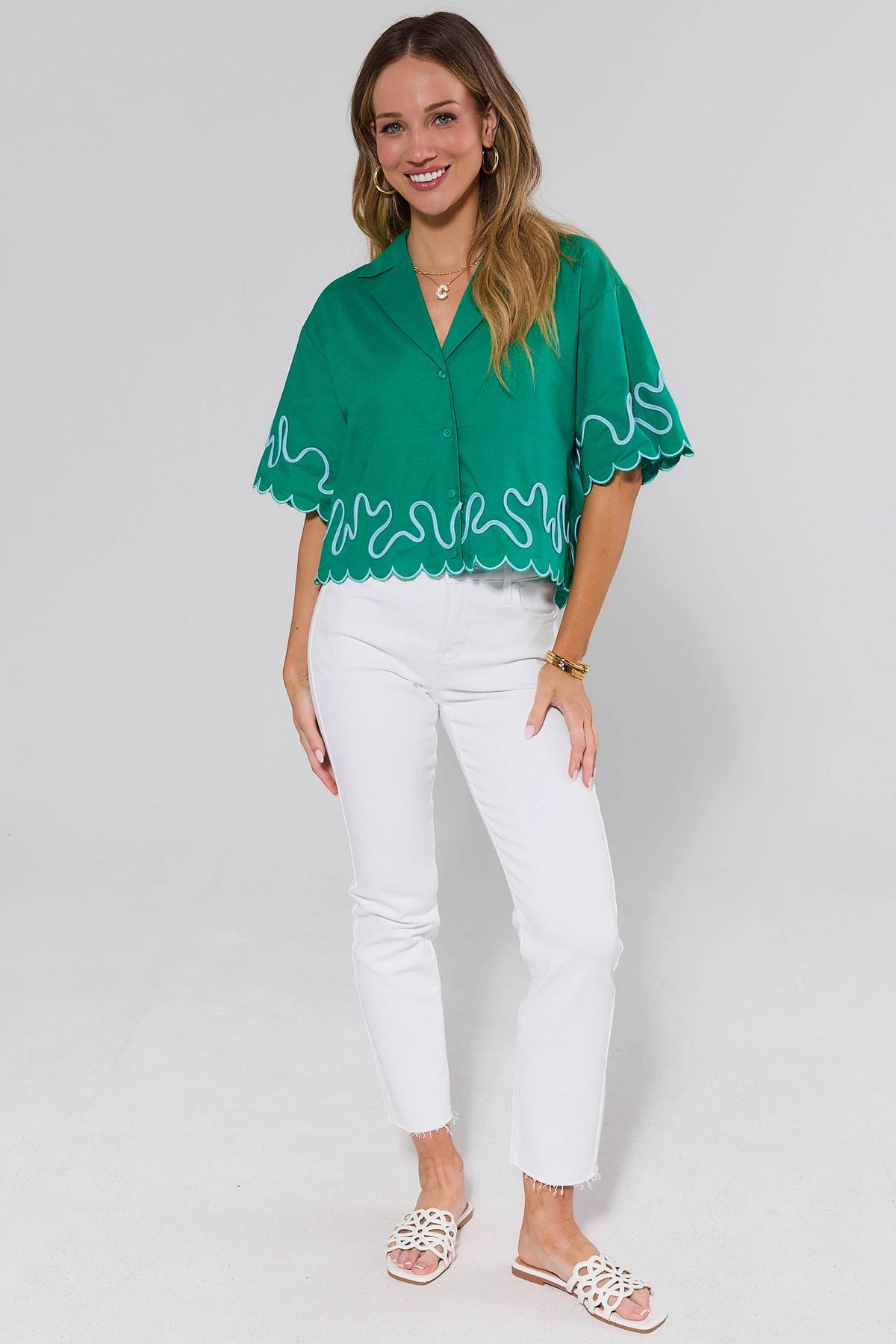 Green Scalloped Trim Top with white embroidered trim and white pants - Back View | Avara
