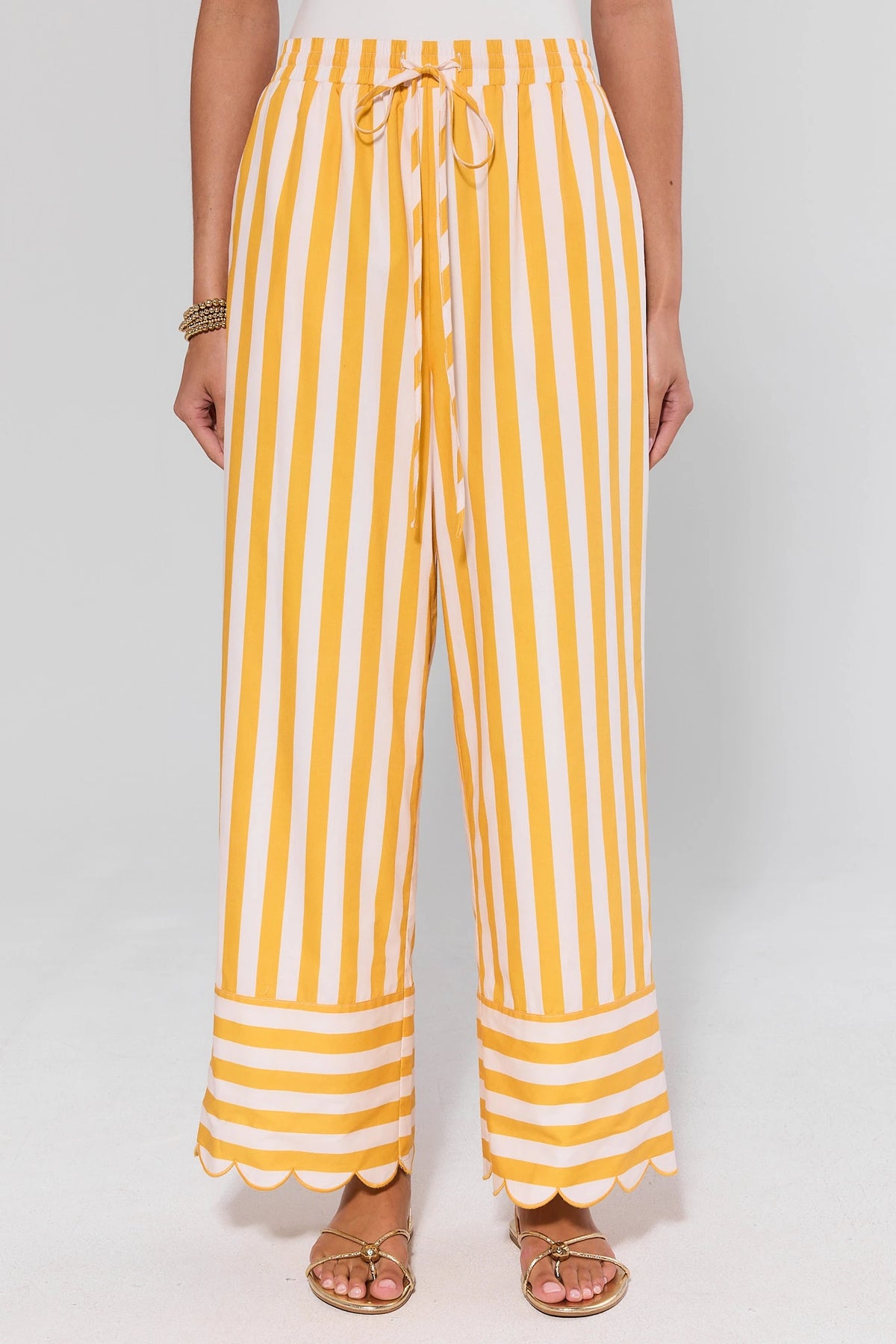 Yellow and white striped wide leg pants with scallop hem and drawstring waist - Front Close-Up | Avara