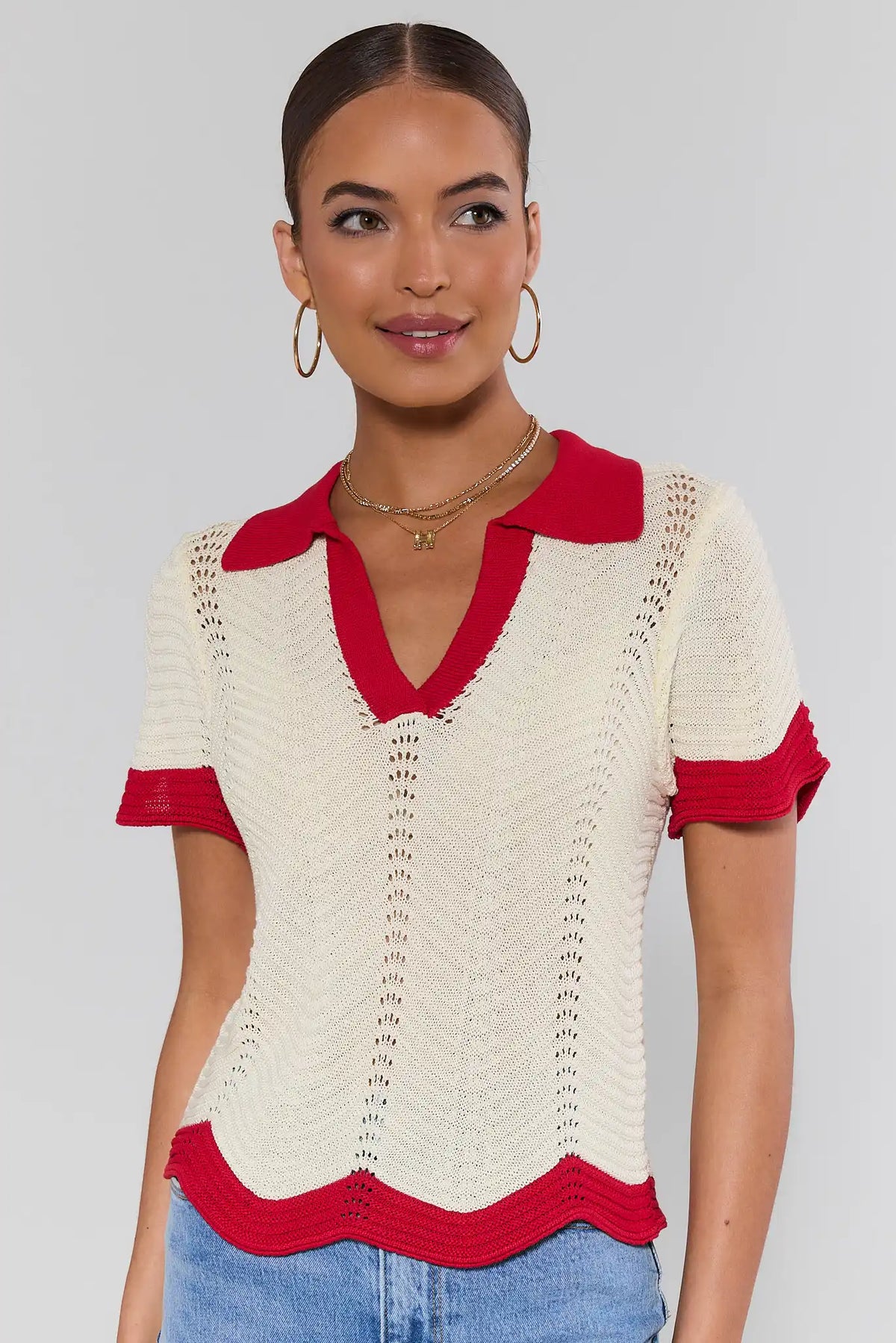 Ivory crochet knit top with red contrast collar and scalloped trim - Front View On Model | Avara
