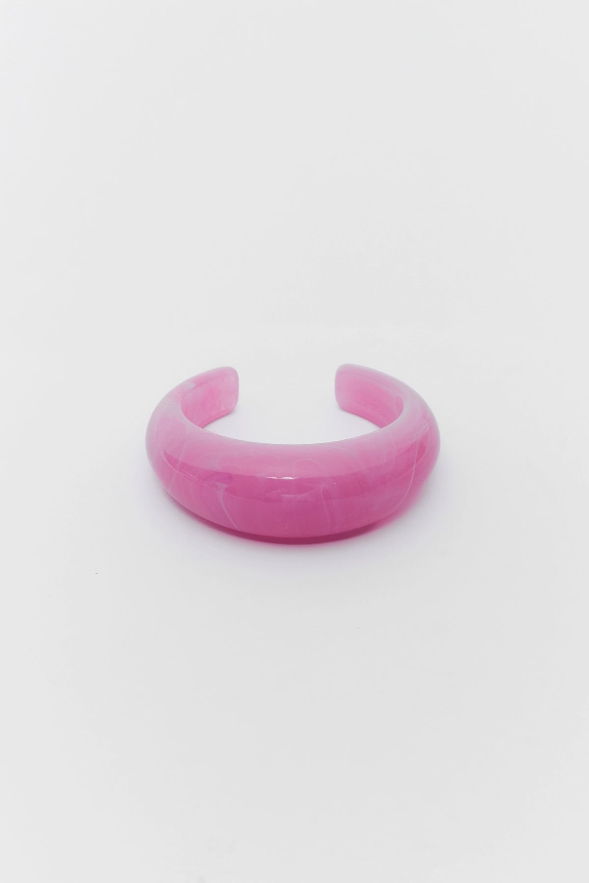 Pink bracelet on a white background