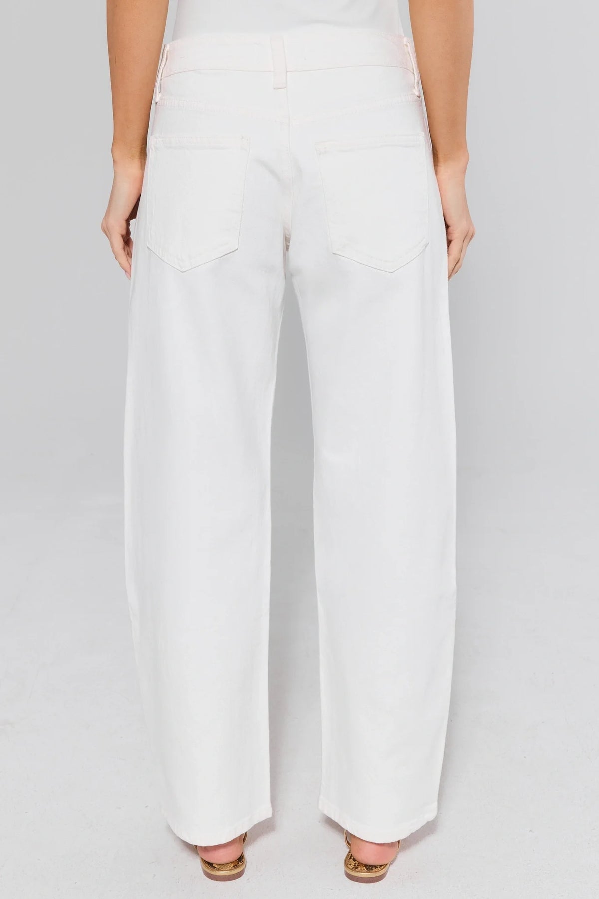 White Lexi barrel leg jeans back view showing wide-leg denim silhouette and back pockets | Avara