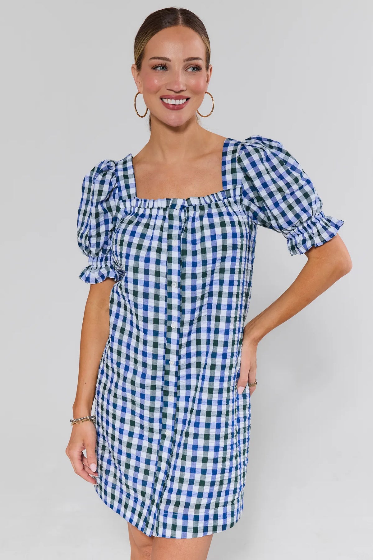 Navy gingham puff sleeve short dress, square neckline, front view on model | Avara