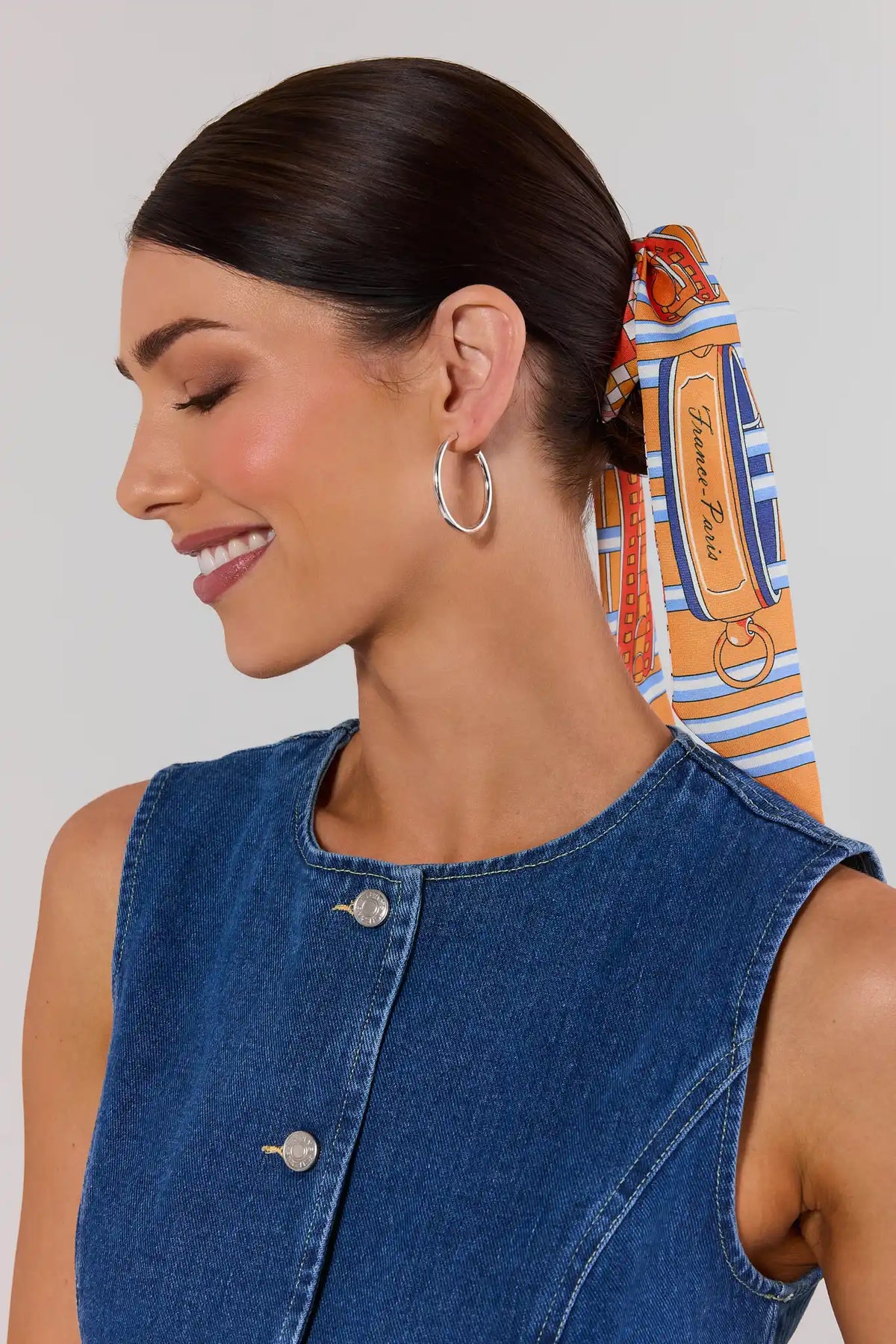 Woman wearing Emily Silver Small Hoop Earrings with printed hair scarf - On Model | Avara