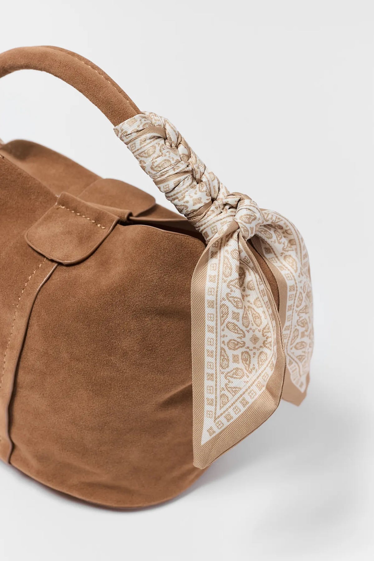 Tan Faux Suede Bag Knotted Paisley Scarf Handle Close-Up - Texture & Scarf Detail | Avara