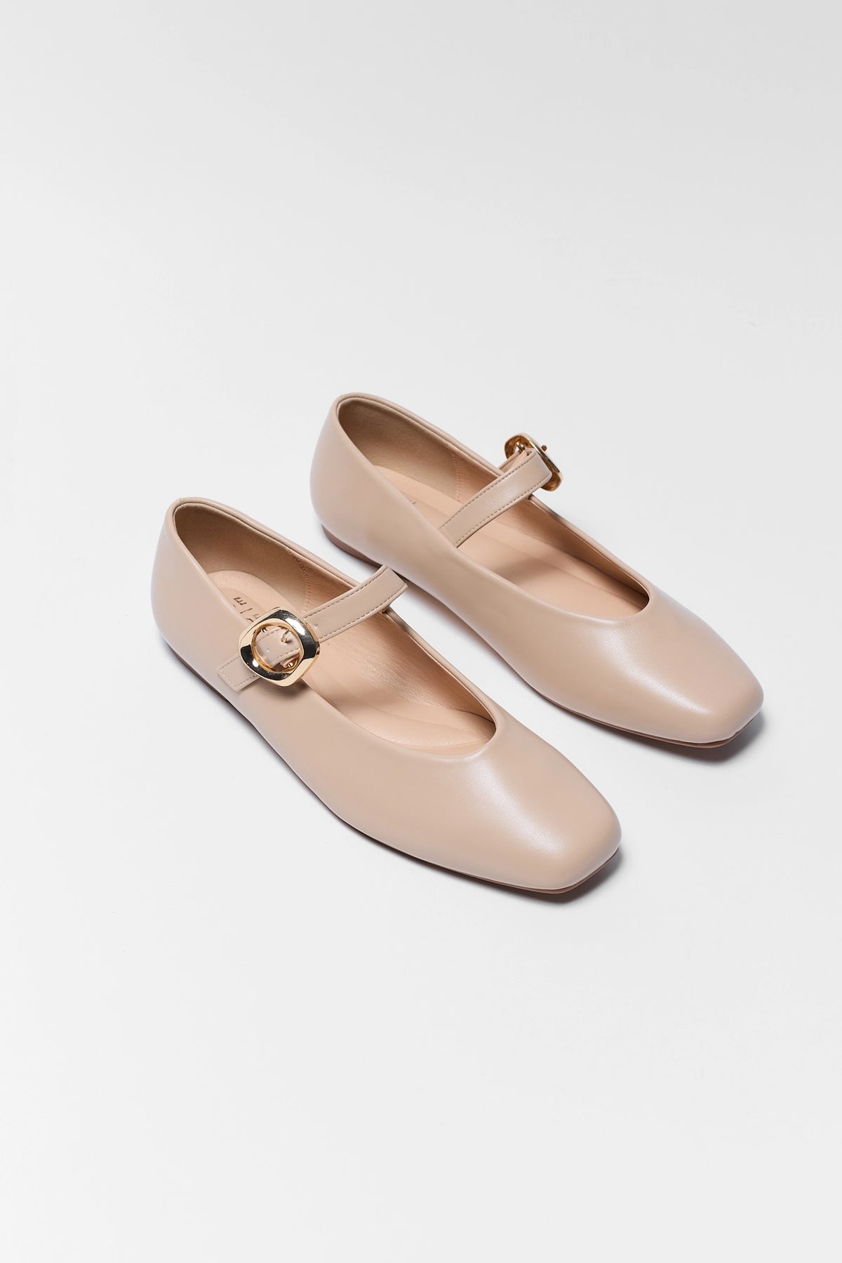 Nude Faux Leather Buckle Strap Ballet Flats - Pair Flat Lay | Avara