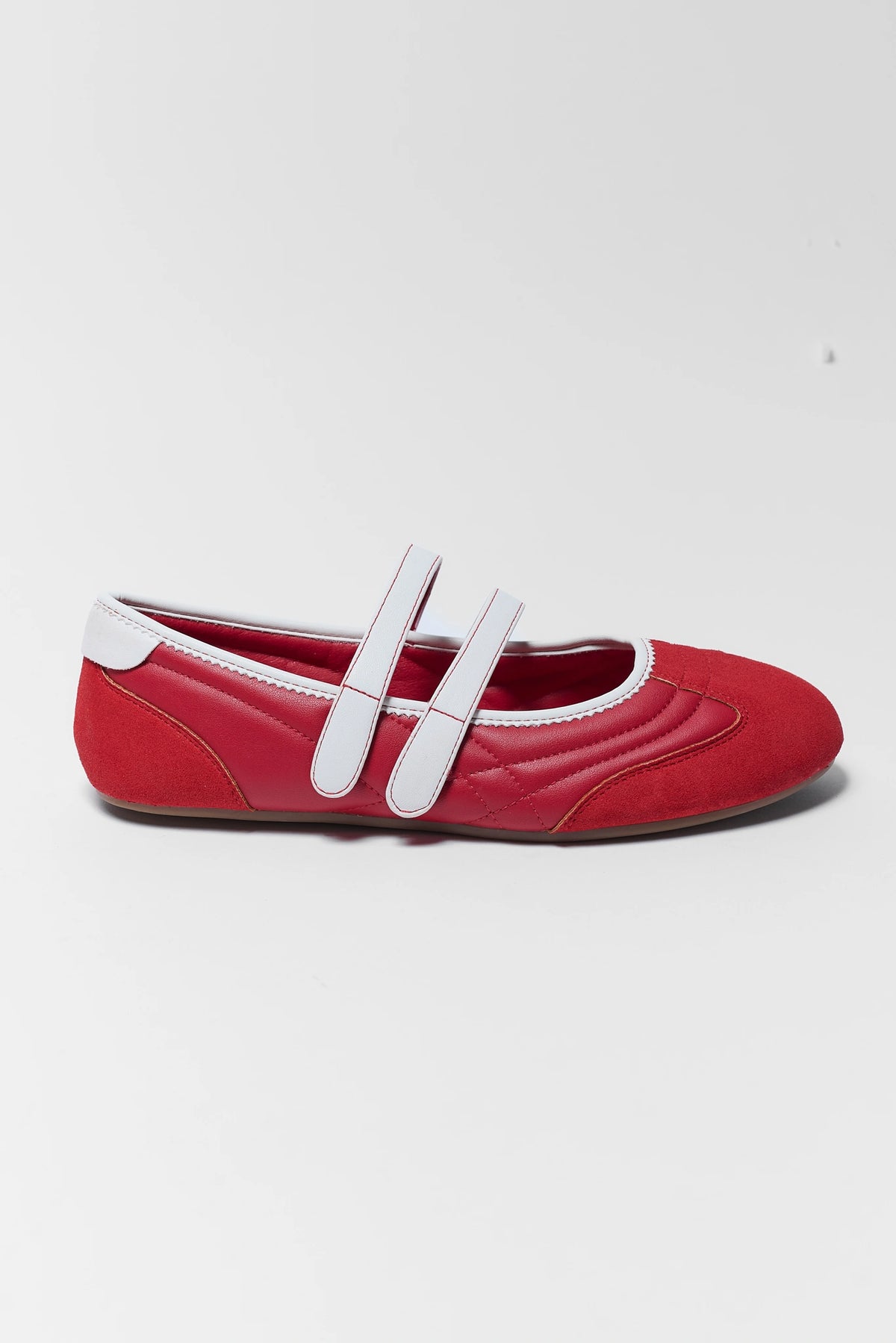 one red flat sneakers