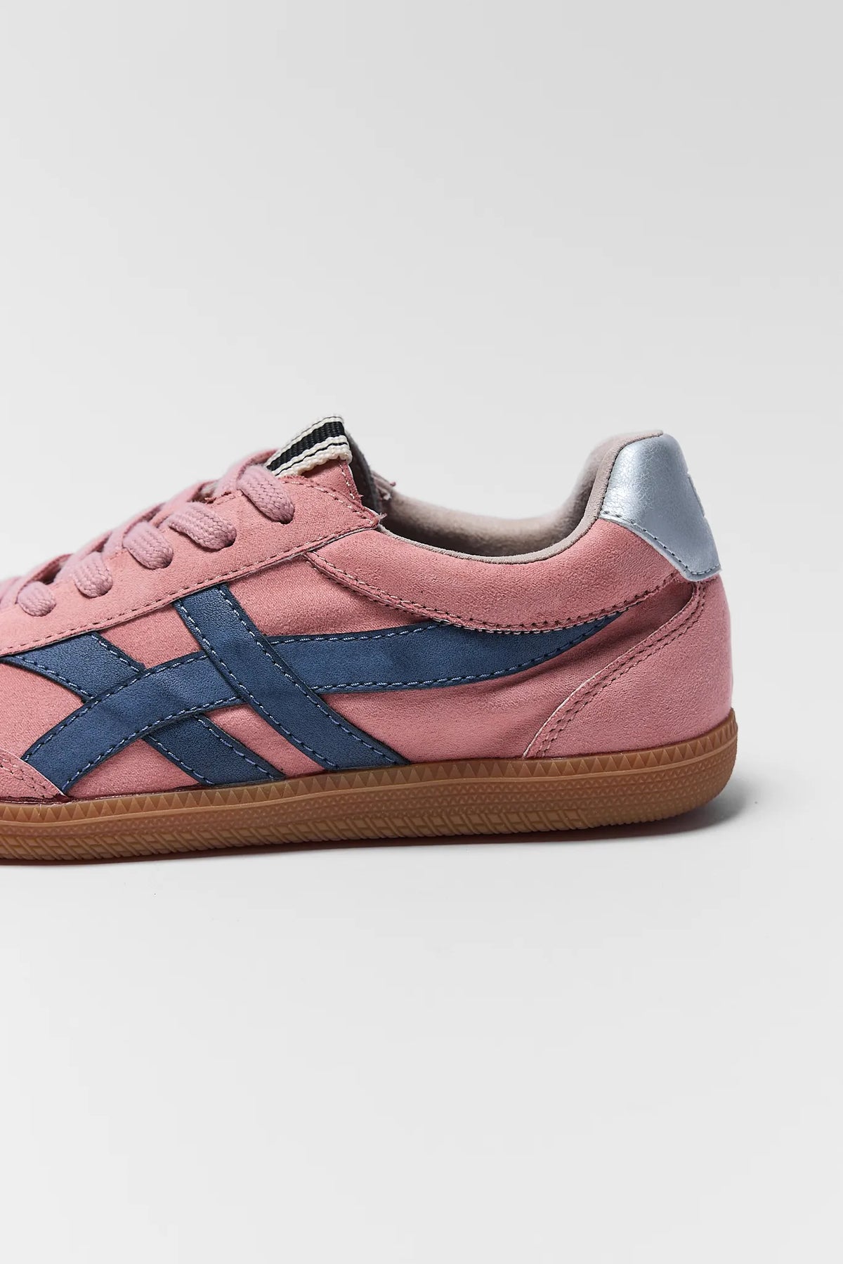 Pink faux suede sneakers with navy details and silver heel tab - Back Angle, fun shoes for women | Avara