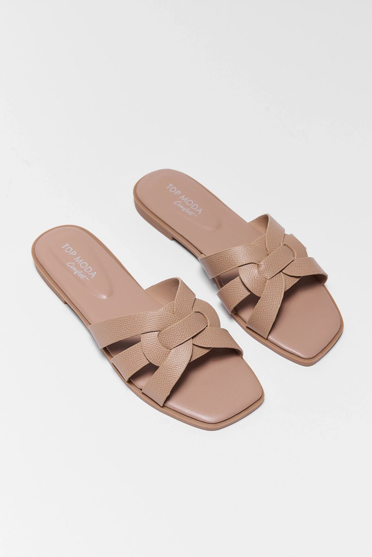 Pair of tan slip on sandals with woven strap detail and square toe - Top Down View | Avara