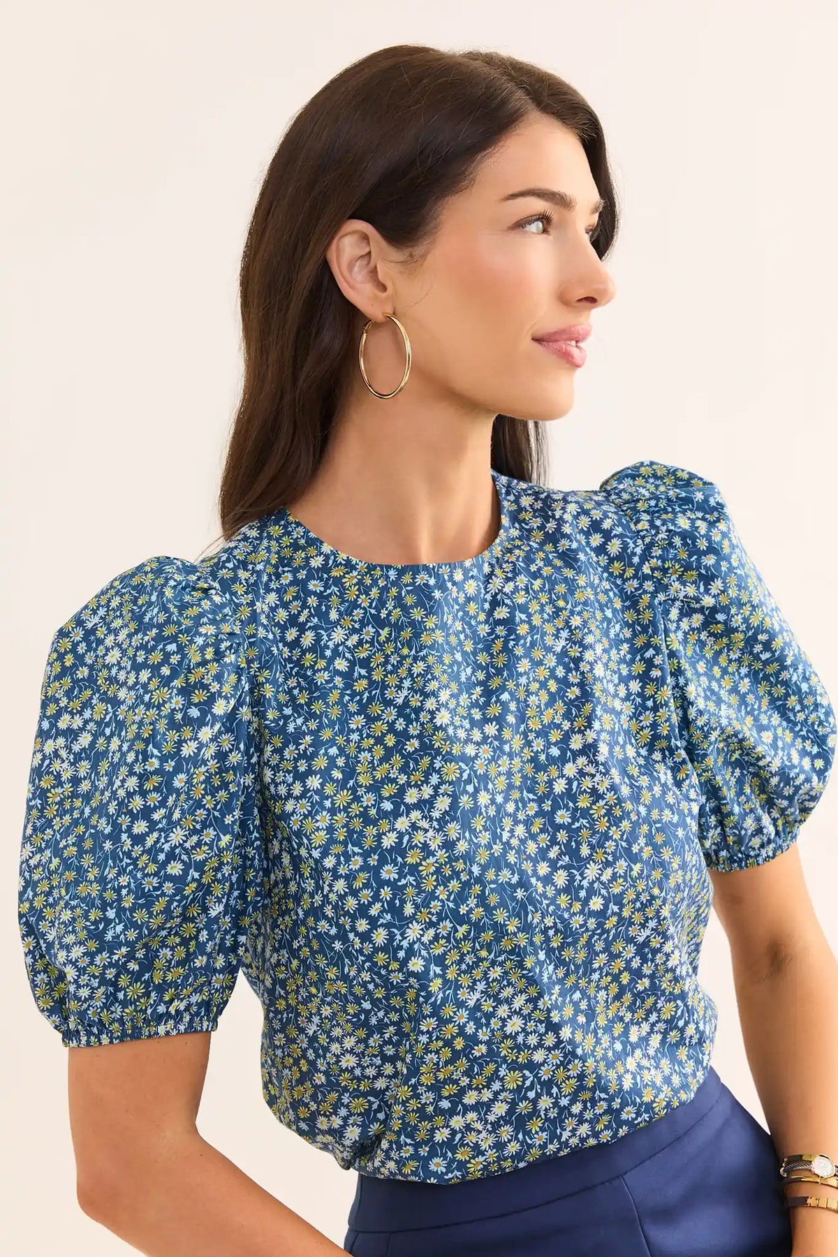 Victoria Navy Floral Print Top with puff sleeves and daisy ditsy print, side profile close-up | Avara