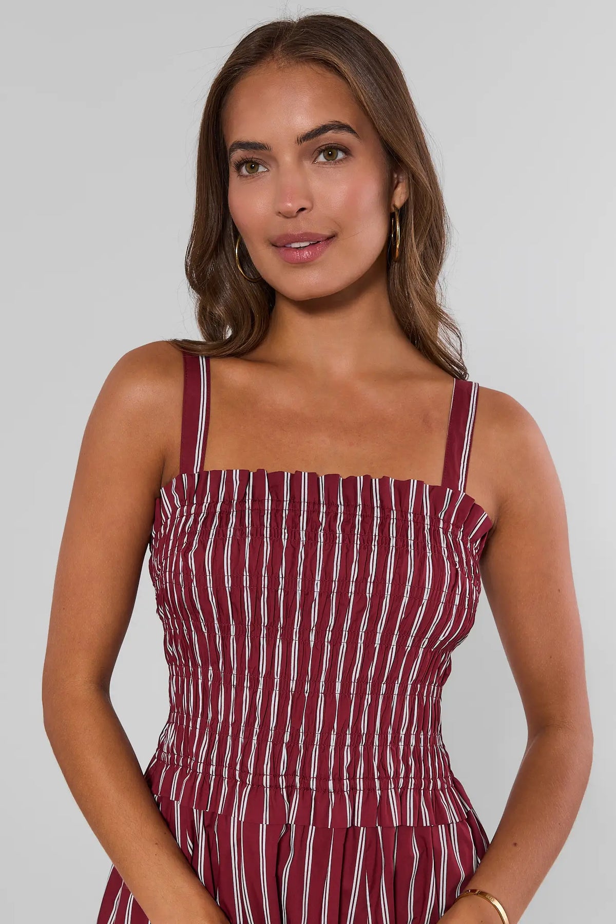 Maroon striped smocked bodice close-up with square neckline and wide shoulder straps - Bodice Detail | Avara