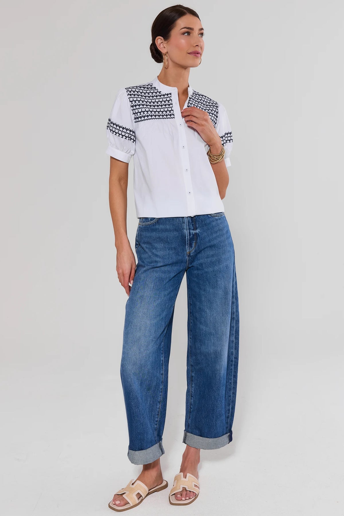 Trudy White Navy Embroidered Top styled with wide-leg jeans - Full Length View | Avara