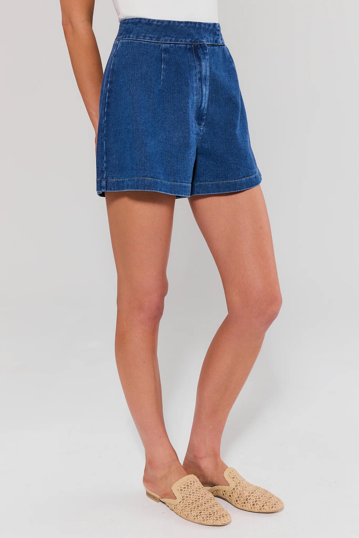 Medium Wash Denim Tailored Shorts - Side Profile On Model | Avara