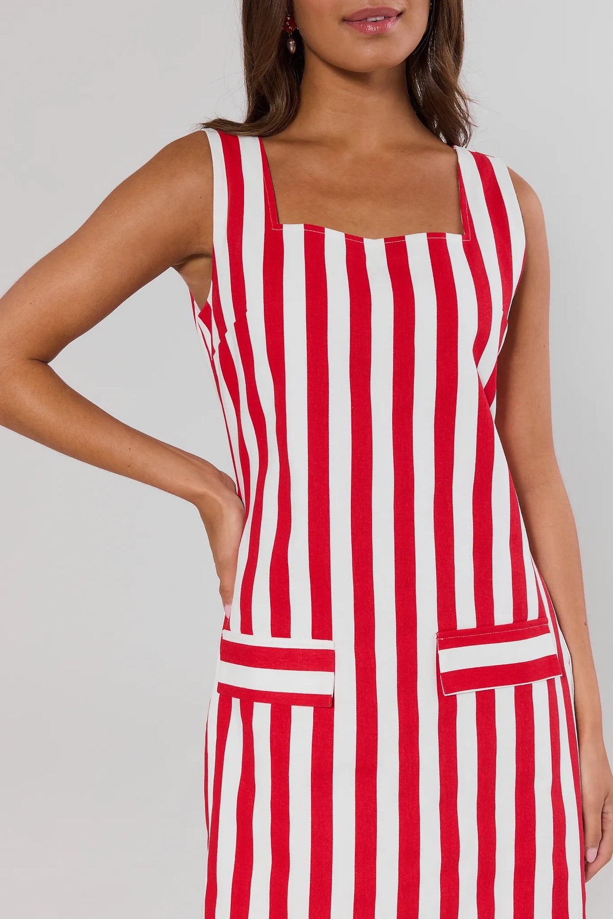 Red striped dress square neckline and patch pocket detail close-up - Front Detail | Avara
