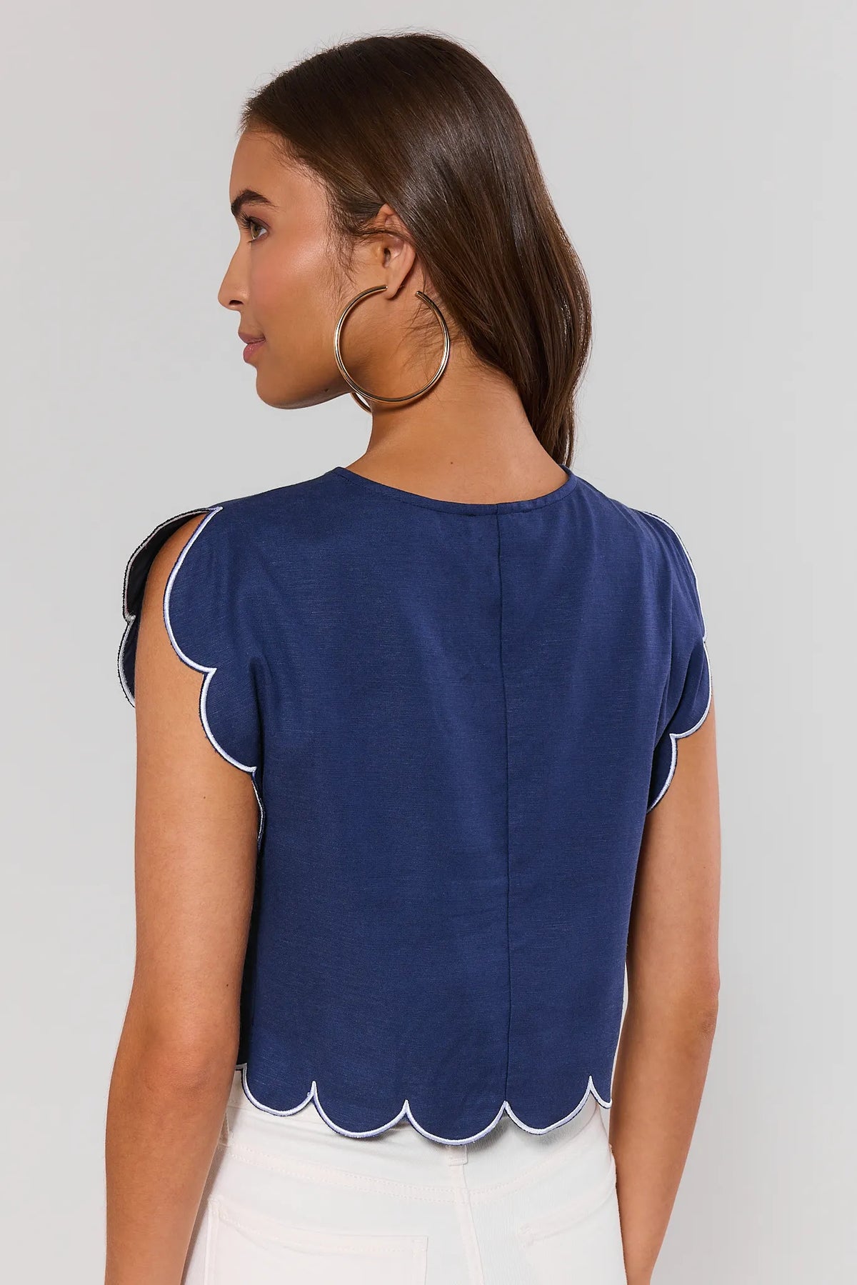 Navy scalloped short sleeve top with white contrast trim - Back View on Model | Avara