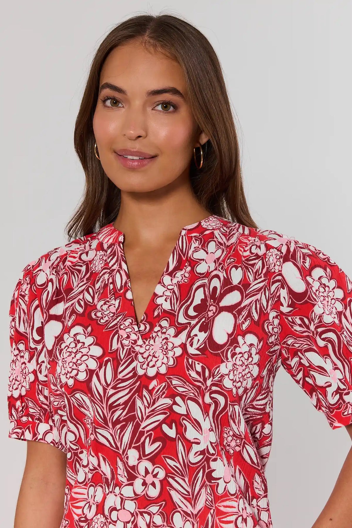 Red Floral Gauze Top split neckline and puff sleeve detail - Close-Up View | Avara