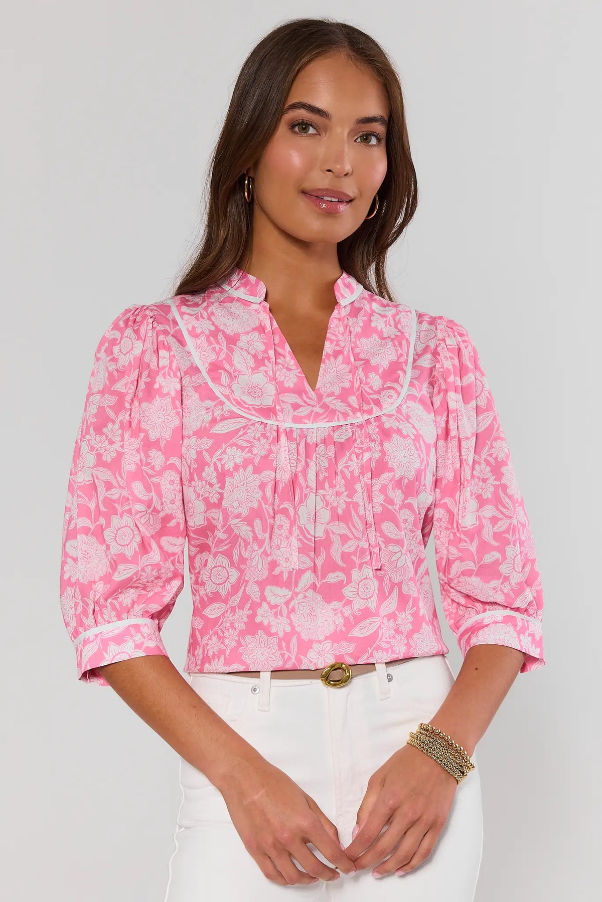 Parker Pink Floral Print Top with white contrast piping and puff sleeves, front view on model | Avara
