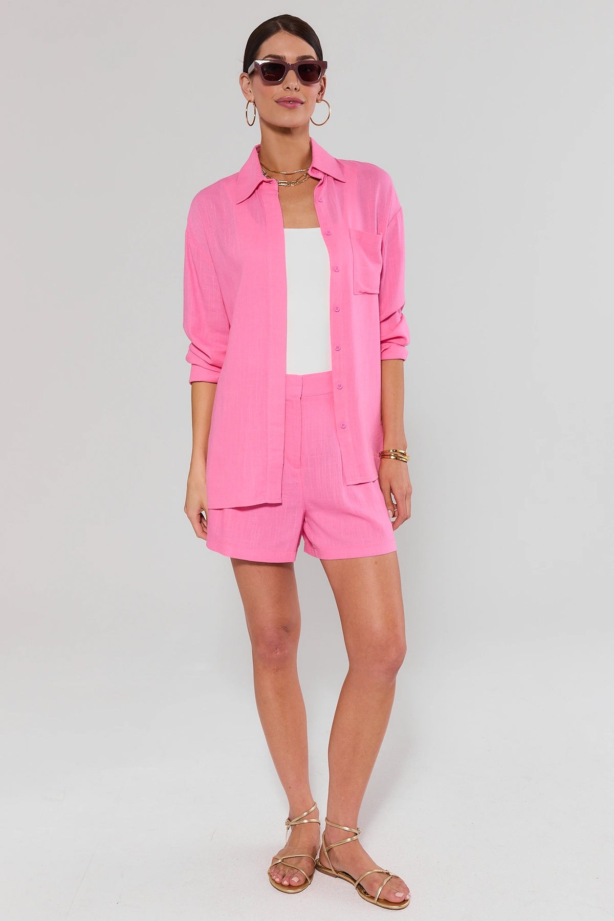 Pink Button Up Top with matching shorts and sunglasses - Full Length Front View | Avara