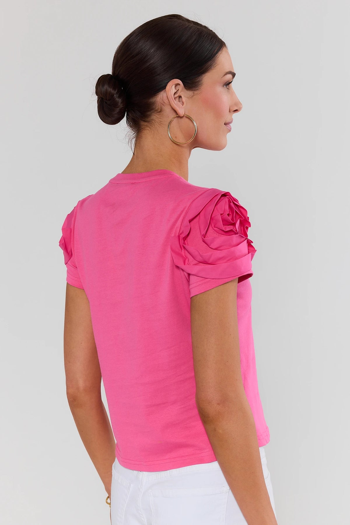 Back view of pink Kendall Floral Appliqué Top showing rosette sleeve detail - Cute Top for Women | Avara