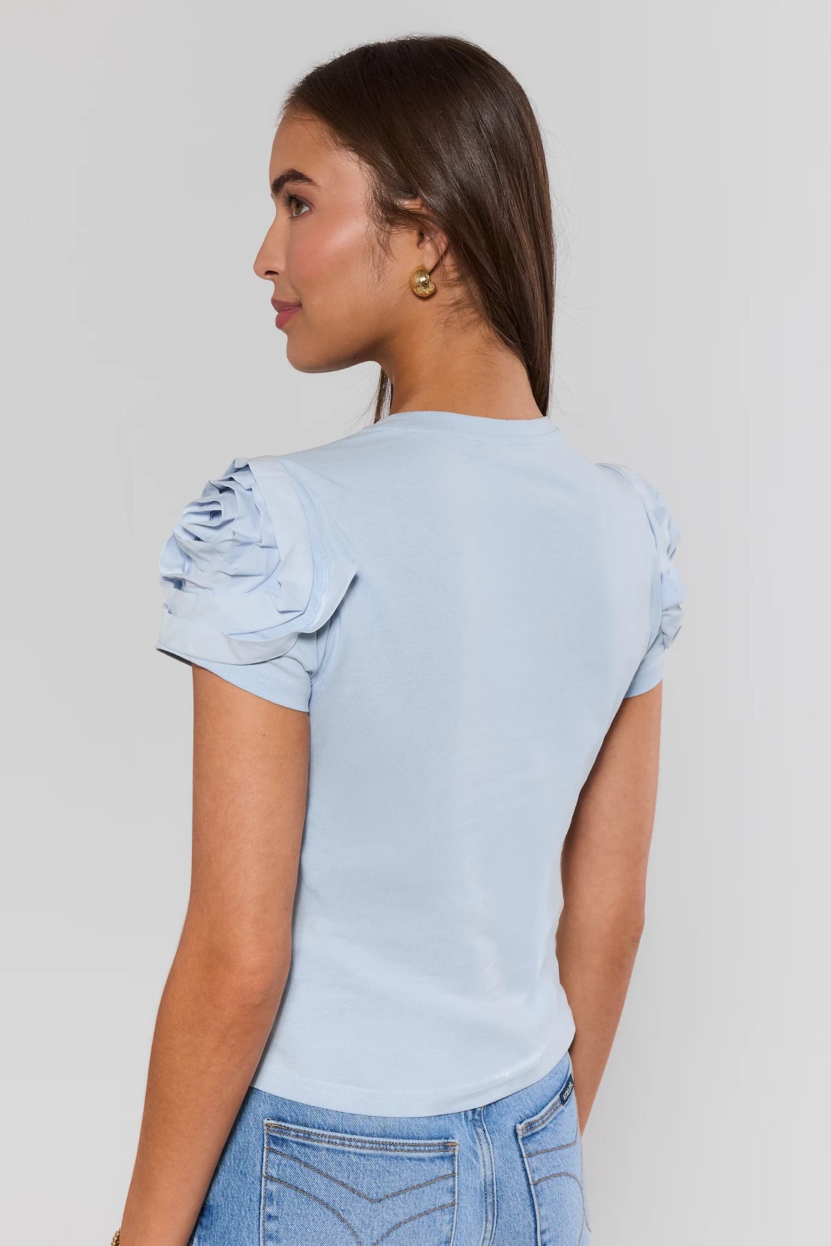Light blue Kendall Floral Appliqué Top showing rosette sleeve and clean back - Back View | Avara