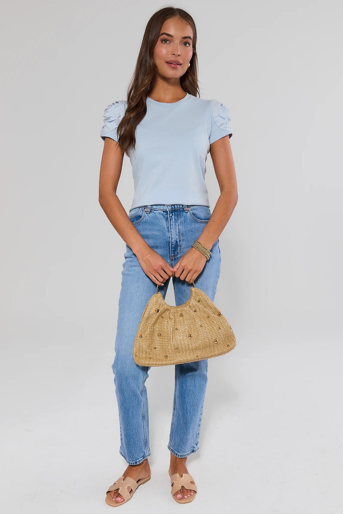 Light blue Kendall Floral Appliqué Top with jeans and woven bag - Full Length Styled Look | Avara