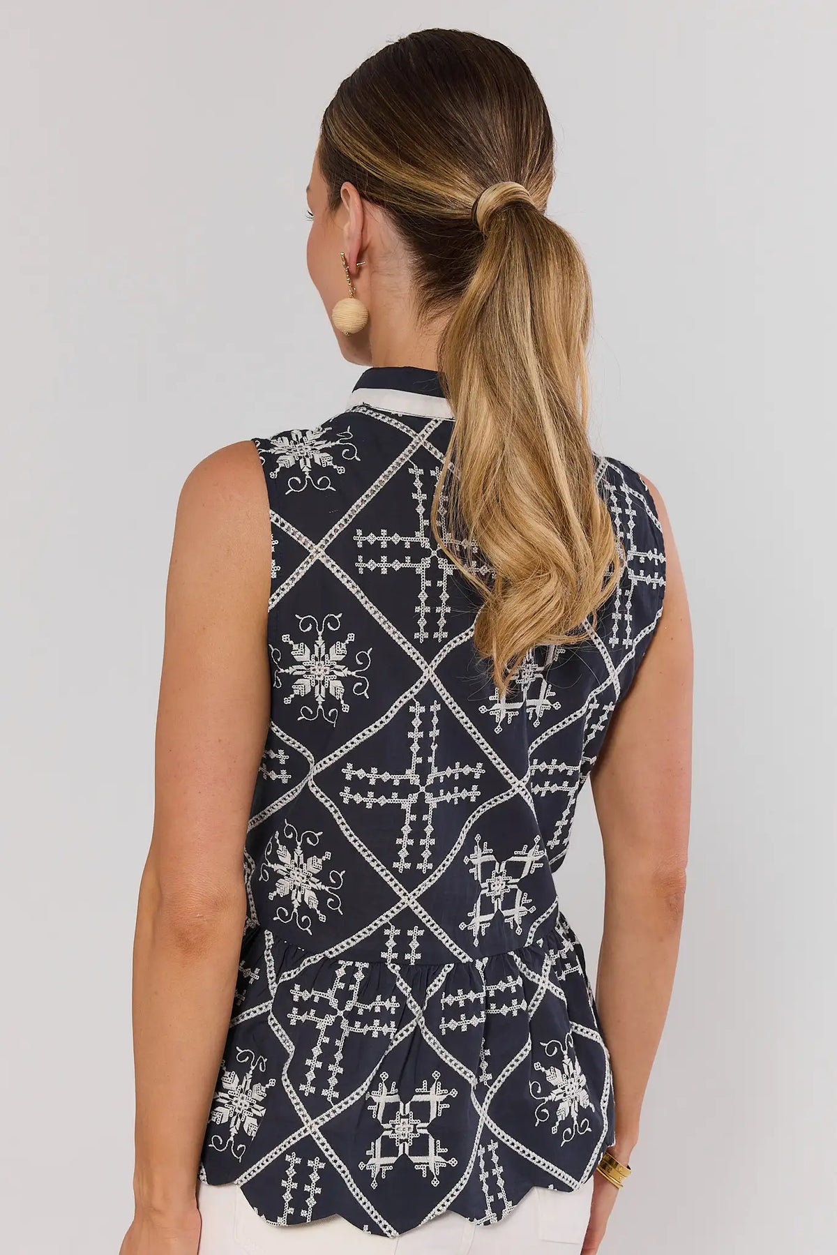 Lyric Navy Embroidered Peplum Tank Top - Back View, Scalloped Hem & White Collar Trim | Avara