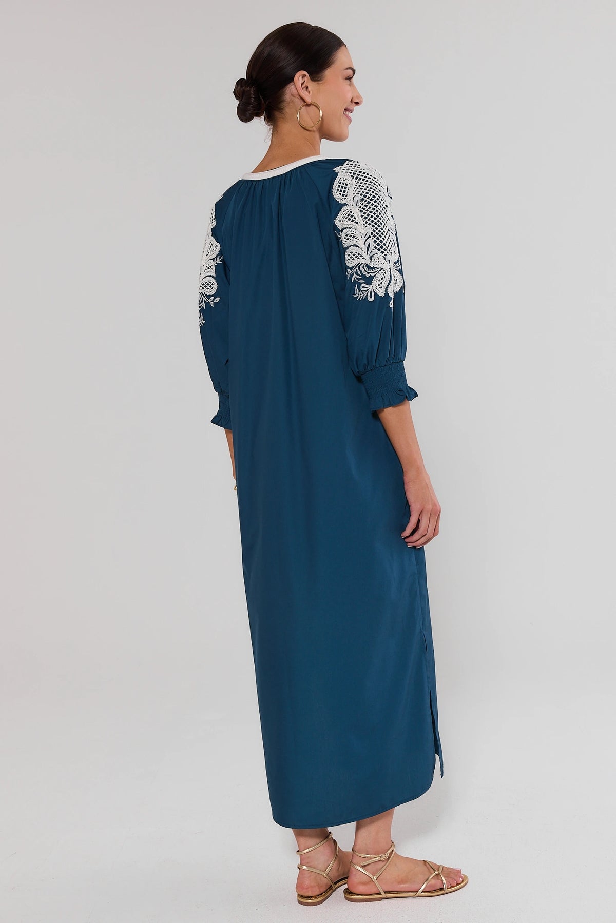 Vivian Navy Embroidered Midi Dress - Back View, white embroidered sleeves and side slit | Avara