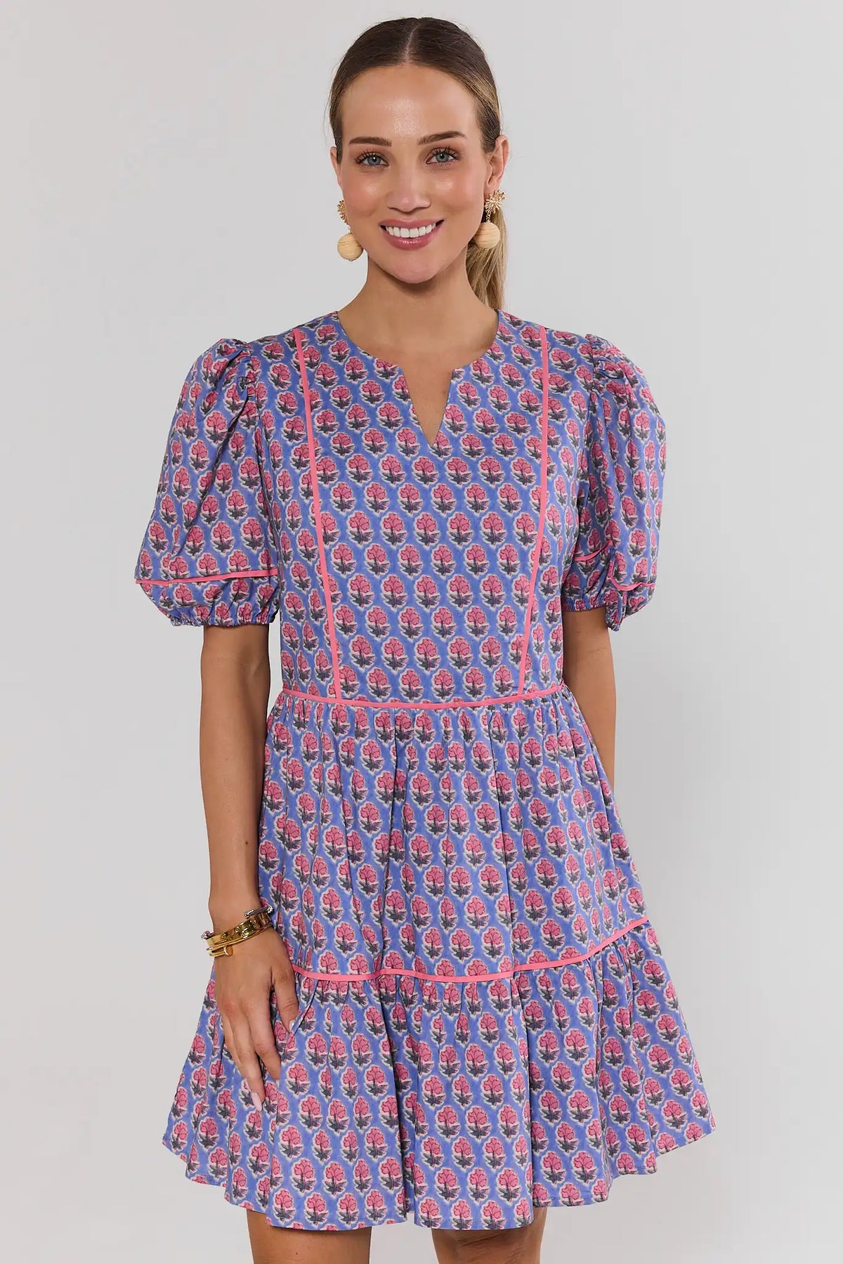 Landry Blue Floral Print Tiered Short Dress with Pink Piping - Front View On Model | Avara