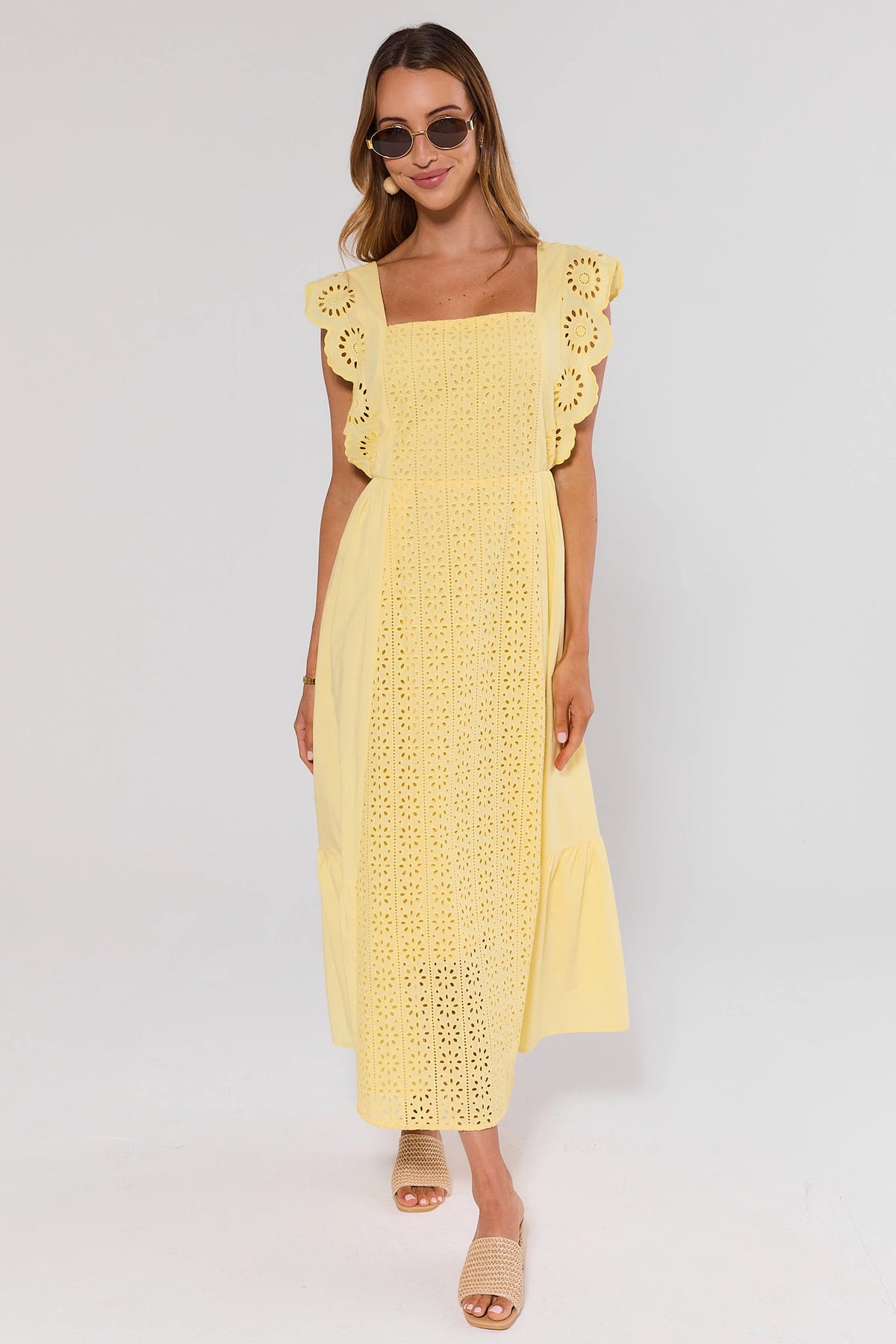 Yellow Eyelet Flutter Sleeve Midi Dress - Full Front View with Sunglasses & Woven Mules | Avara