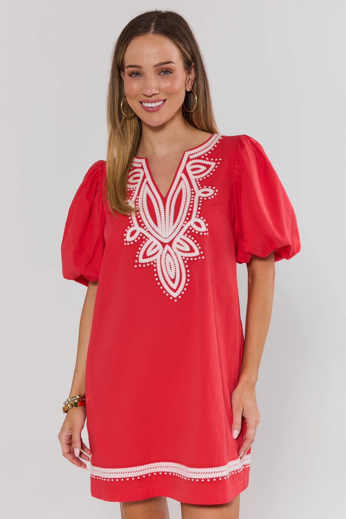 Roxanne Red Embroidered Short Dress front view with gold sandals, A-line silhouette on model | Avara