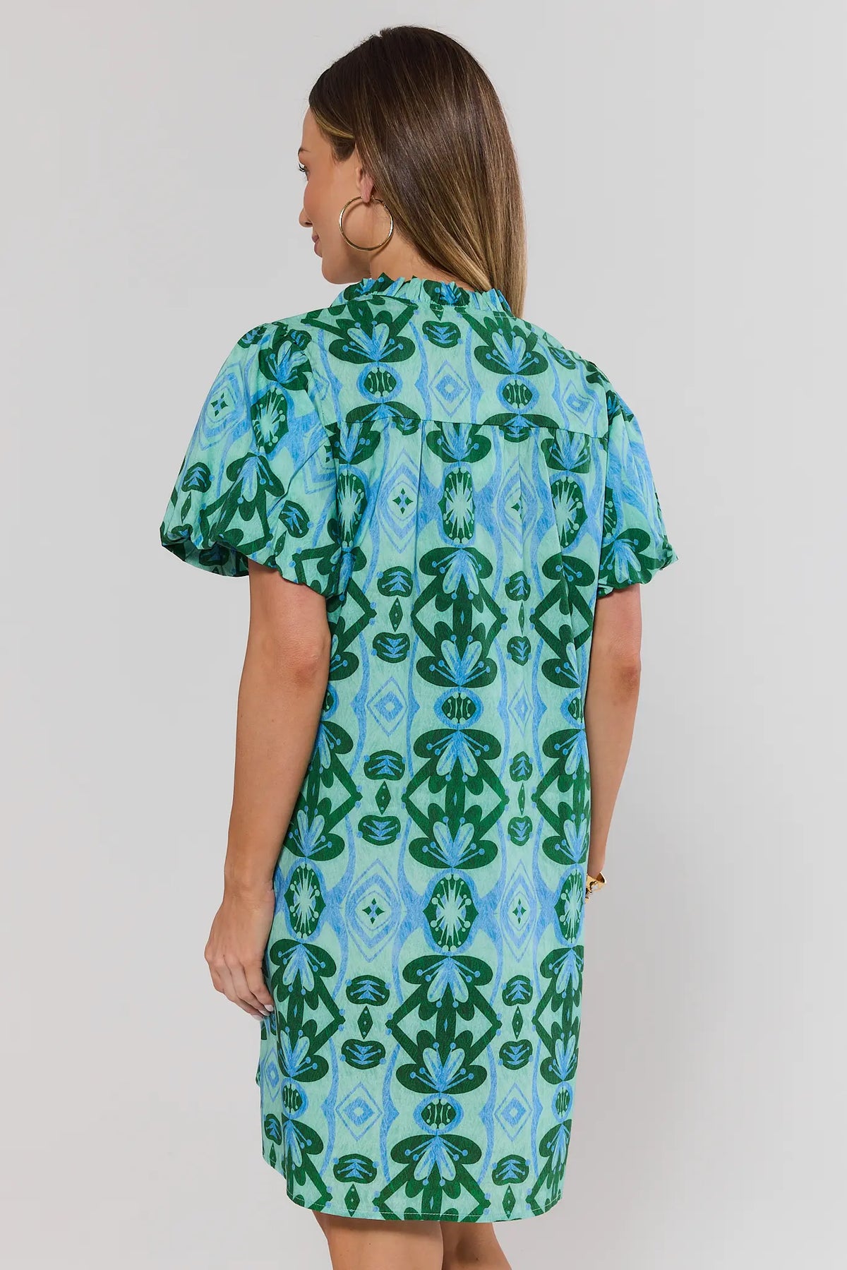 Reina Green Printed Short Dress back view showing puff sleeves and abstract print detail | Avara