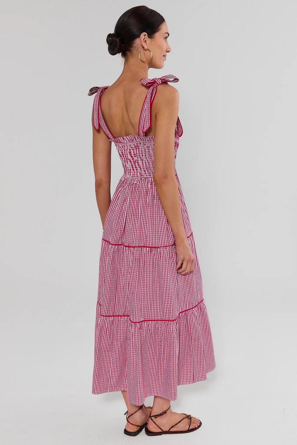Grace Red Gingham Smocked Maxi Dress - Back View, open back smocked bodice with gingham tie-bow shoulder straps | Avara