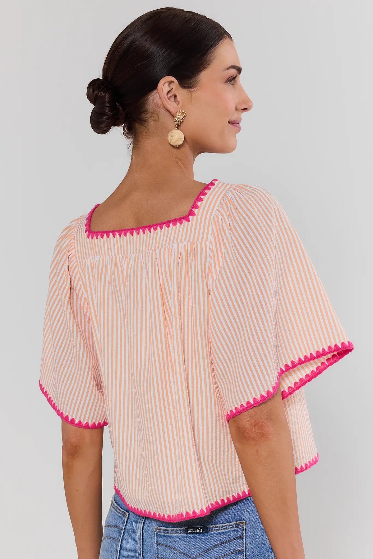 Orange striped seersucker top with pink contrast trim - Back View | Avara