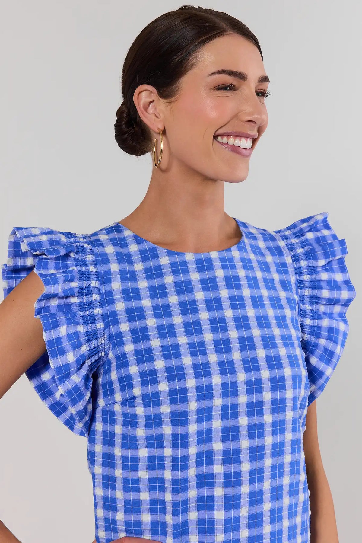 Bethany Blue Gingham Flutter Sleeve Top close-up, smocked flutter sleeve detail and round neckline | Avara