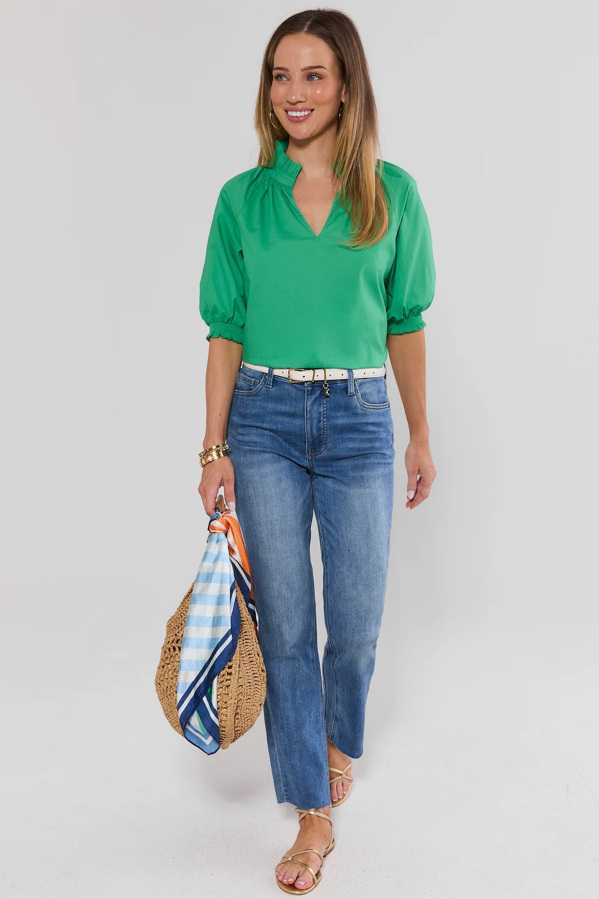 Merrick Green Split Neck Top styled with blue jeans and straw tote bag, full-length front view | Avara